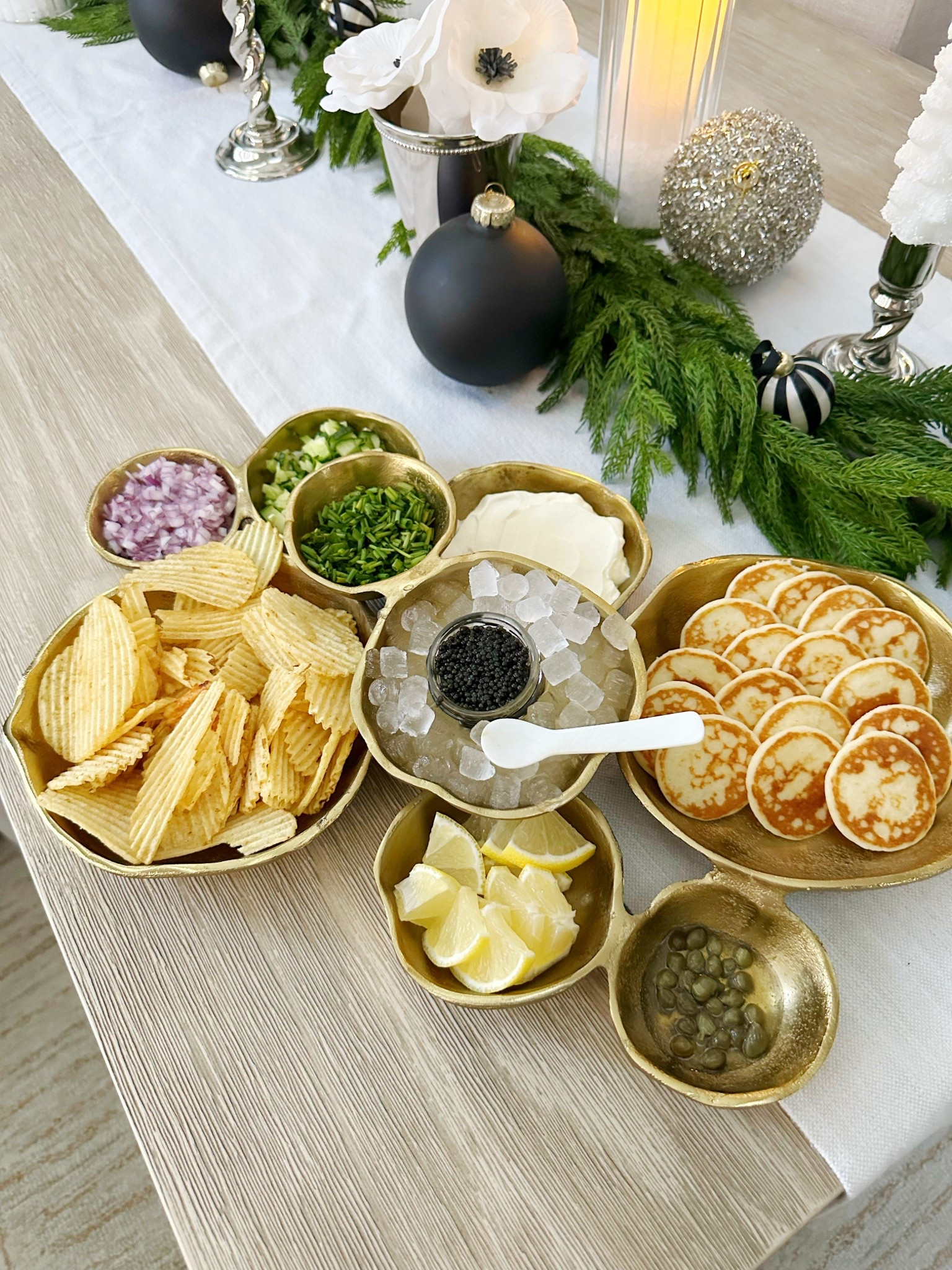 The holidays are all about creating special moments, and I love a caviar tray! It makes evenings and parties that much more special, especially when served in this pretty gold tray. ✨ 

#LTKGiftGuide #LTKHome #LTKHoliday
