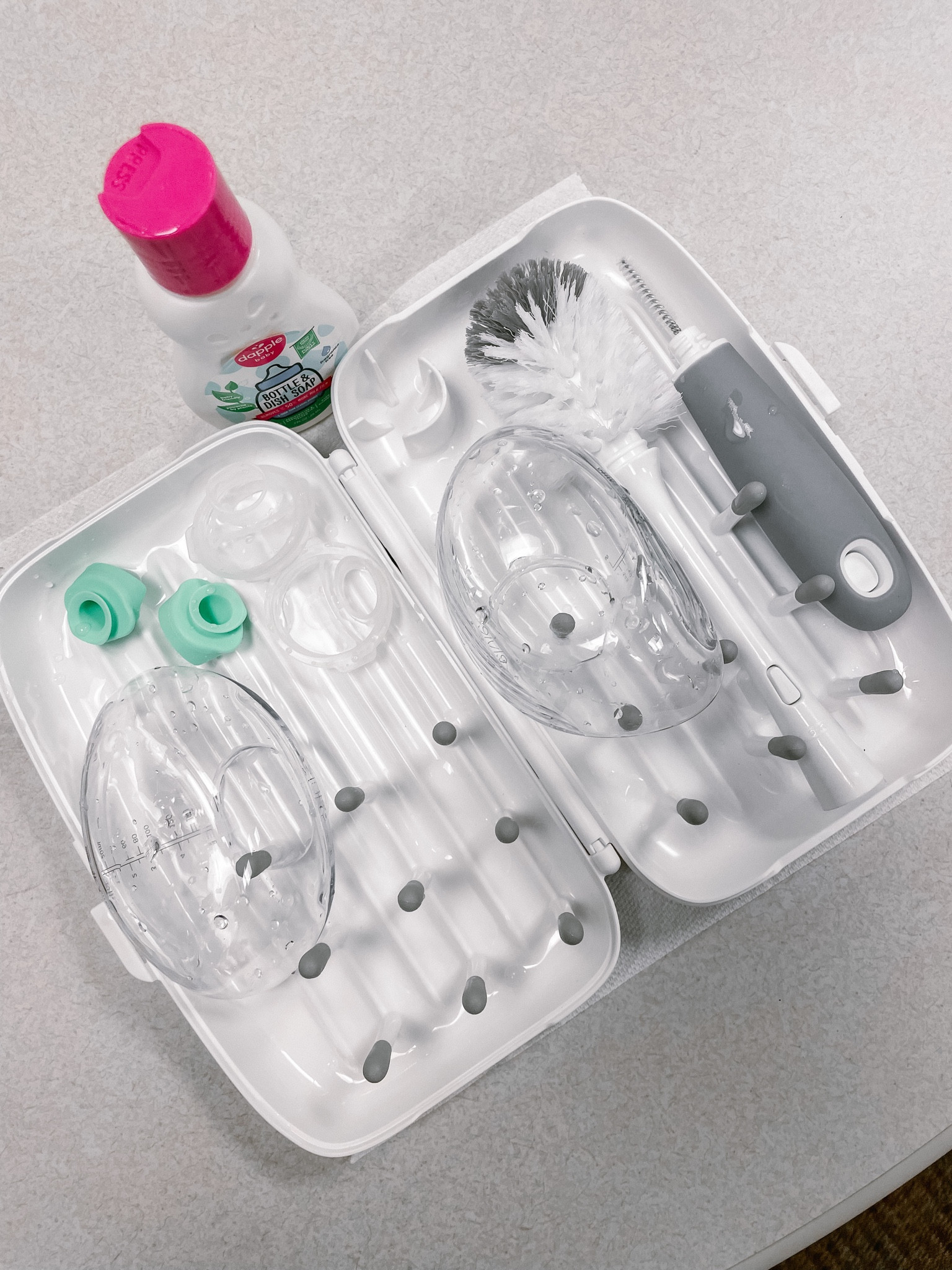 My mom hack of the day- a portable bottle brush and drying rack! I love my portable Elvie pumps and use them 3x per day, twice while at work. Having this drying rack allows me to clean pump bottles at work so there’s less to do when I get home! I wipe down the flanges with the wipes linked below in between uses.

#LTKfamily #LTKFind #LTKbaby