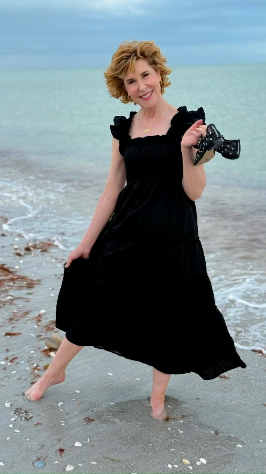 This smocked maxi dress is such an easy summer piece. The feminine ruffled shoulders and tiered skirt make it feel polished, while the lightweight seersucker fabric is breathable and great for travel. I styled it with square-toe Mary Jane flats with a jewel-detailed mesh upper and adjustable strap for a pretty, eye-catching finish.

#LTKOver40 #LTKTravel #LTKSeasonal