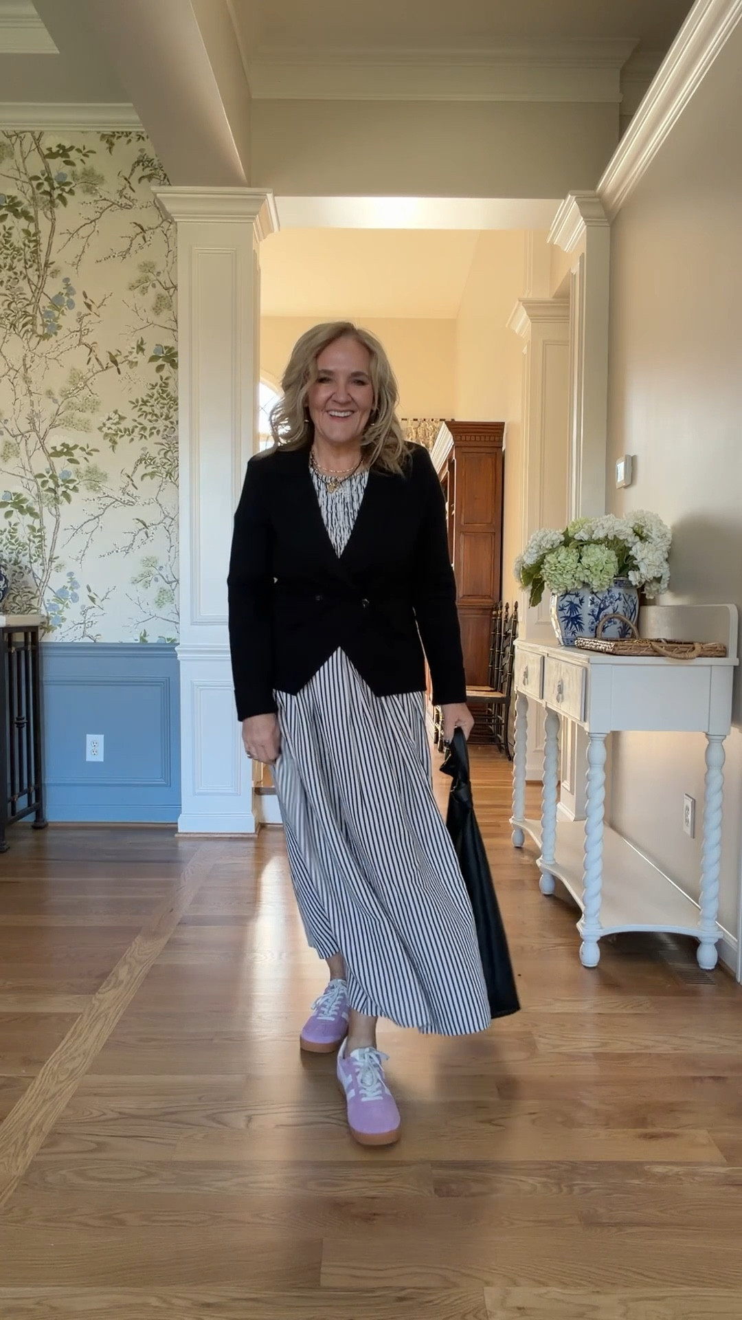 Anthropologie dress I am wearing a regular medium. The smocking sits down in your hips, but it’s really easy to pull it up around your waist and actually looks perfectly normal doing this.

Love the dress for spring and summer. Easy to layer with this lightweight sweat sweater blazer also from Anthropologie. I’m wearing a medium.
Pink sneakers and oversized slouch bag offer for Anthropologie

Spring dress vacation dress

#LTKSaleAlert #LTKOver40 #LTKTravel