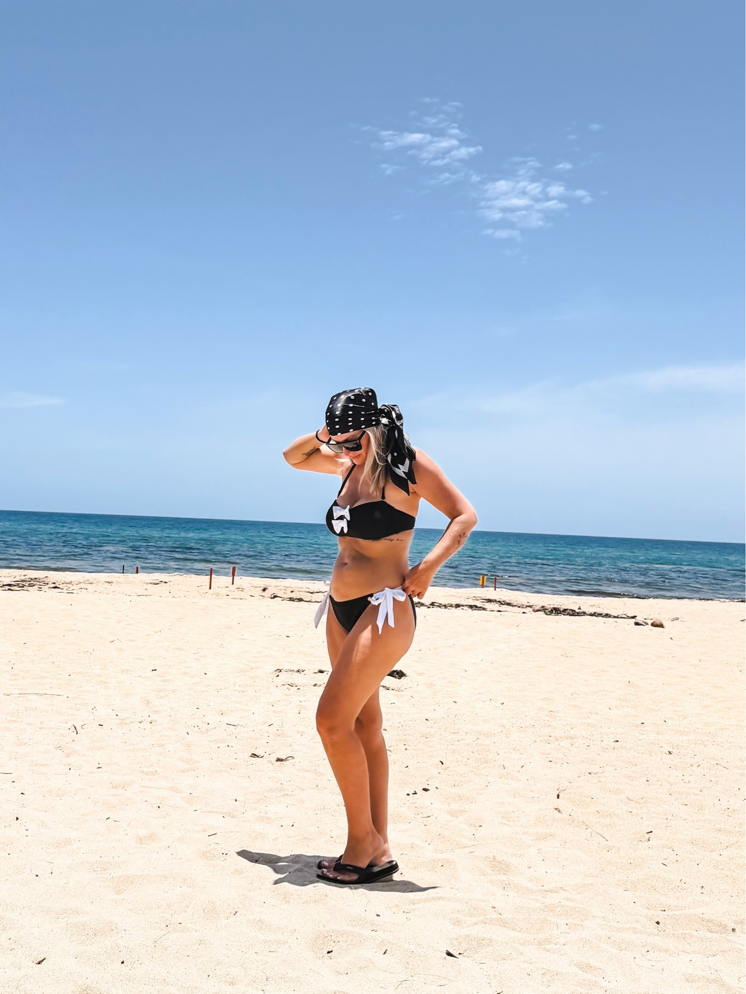 I’m obsessed with this swimsuit. The fit is amazing. I’m wearing a medium in both. 


Black and white bikini, swimsuit, beach outfit, vacation outfit

#LTKSwim #LTKOver40 #LTKSaleAlert