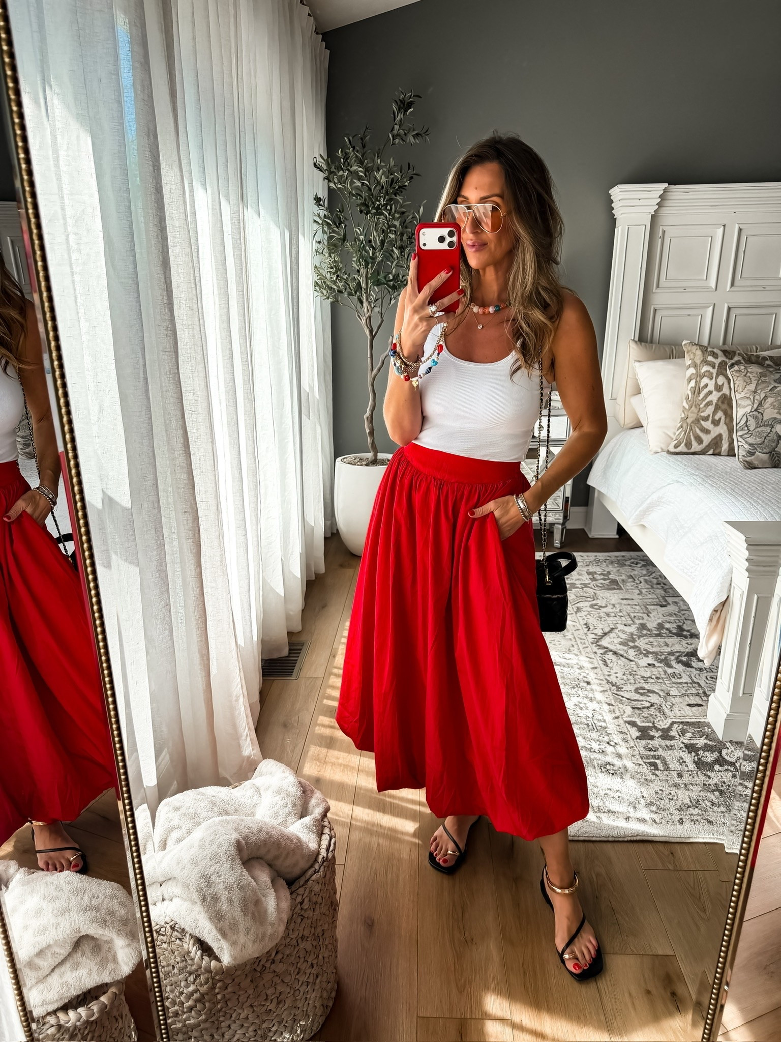 Red, white, and ready for every summer celebration. This flowy skirt is such a statement piece, and I love it paired with a simple tank and colorful accessories for an effortless patriotic look.

red skirt outfit, summer style, patriotic outfit, Fourth of July outfit, midi skirt, casual chic, summer fashion, vacation outfit, red white and blue style, holiday outfit, statement skirt, everyday style, themominstyle

#LTKootd #LTKSeasonal #LTKOver40