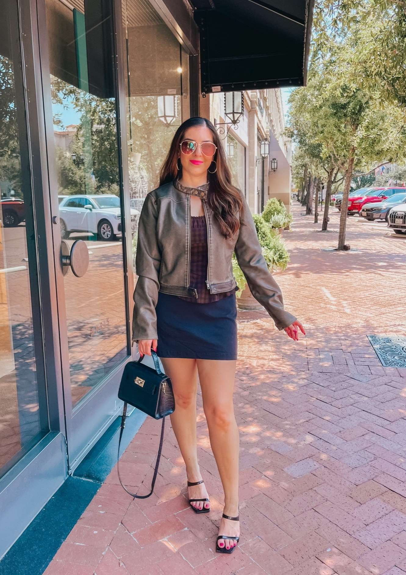Super fun early fall outfit 🖤🤎 The faux leather jacket is a green grey color. Paired with a check patterned corset style top and black mini skirt all from Target Style!

#LTKootd #LTKSeasonal