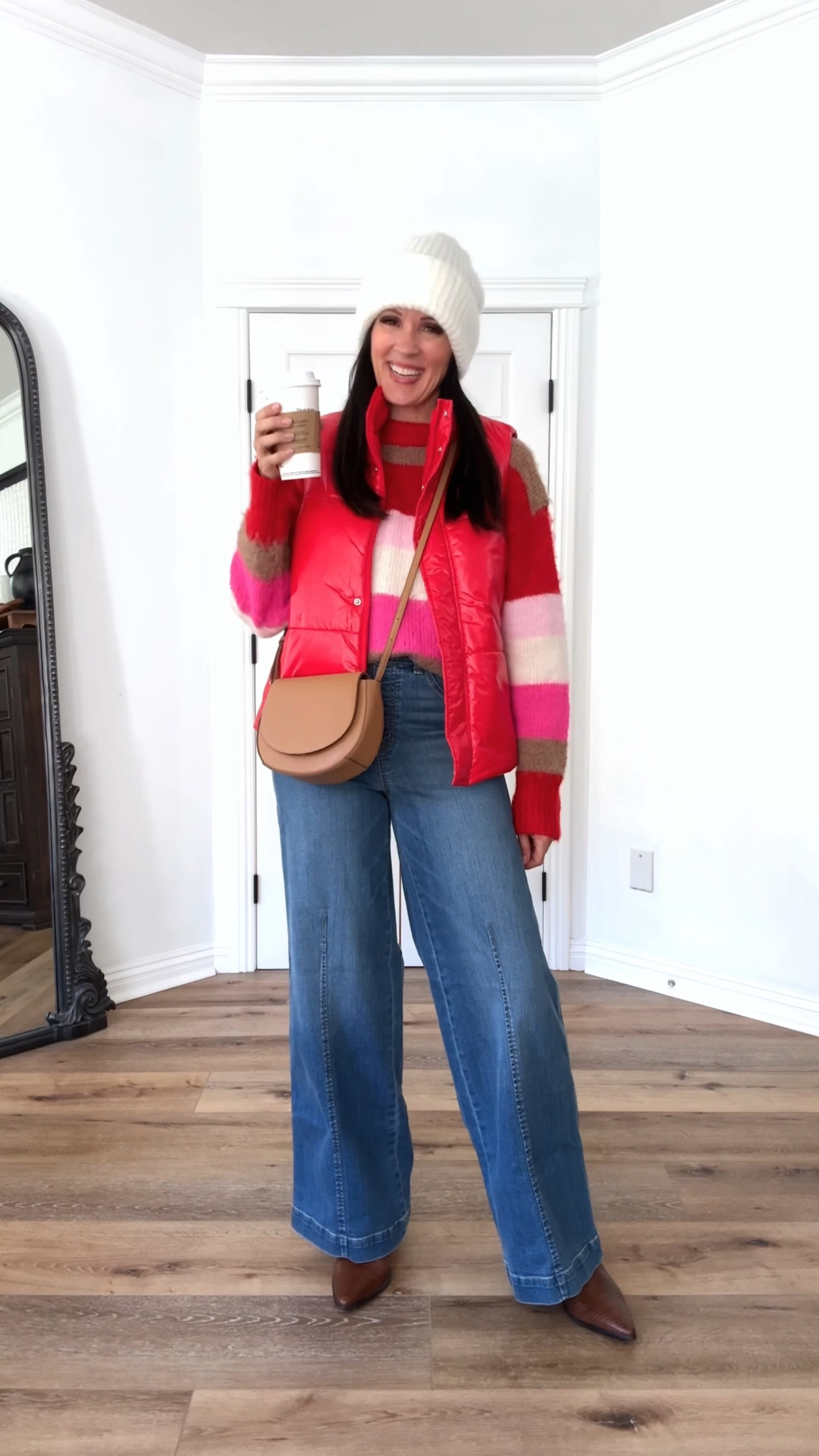 Festive holiday outfit for all the holiday things!

Sizing:
Striped sweater-Target, sized up to a large for roominess 
Wide-leg jeans-Spanx, run tts. In medium. Use code TRACYXSPANX for 10% off plus free shipping. 
Vest-Target, runs TTS. I sized up to medium 
Booties-Matisse, run TTS

Christmas outfit | holiday outfit | free people beanie | Christmas sweater casual outfit | boots 

#LTKover40 #LTKHoliday #LTKstyletip