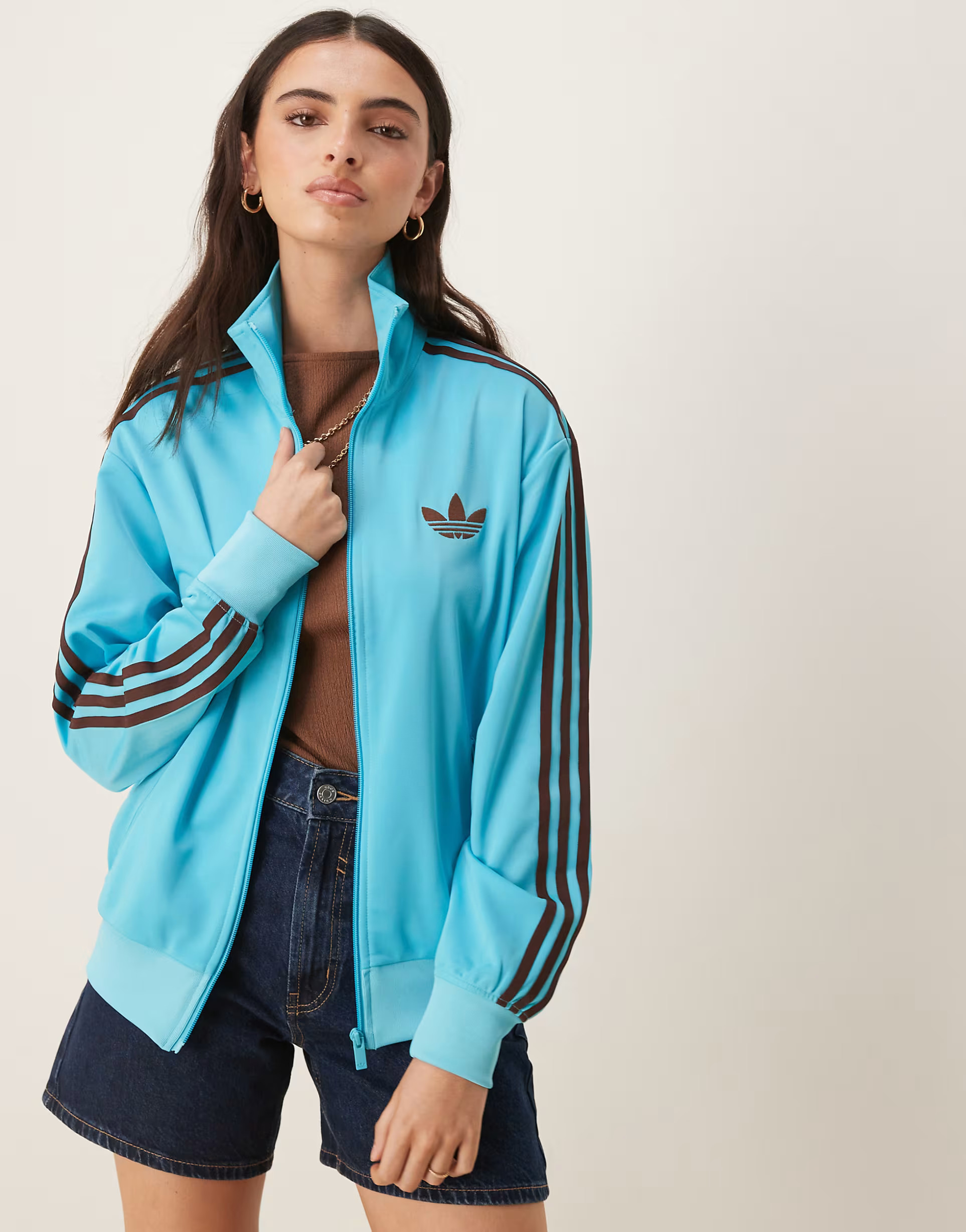 adidas Originals Firebird Loose track top in blue and brown | ASOS (Global)
