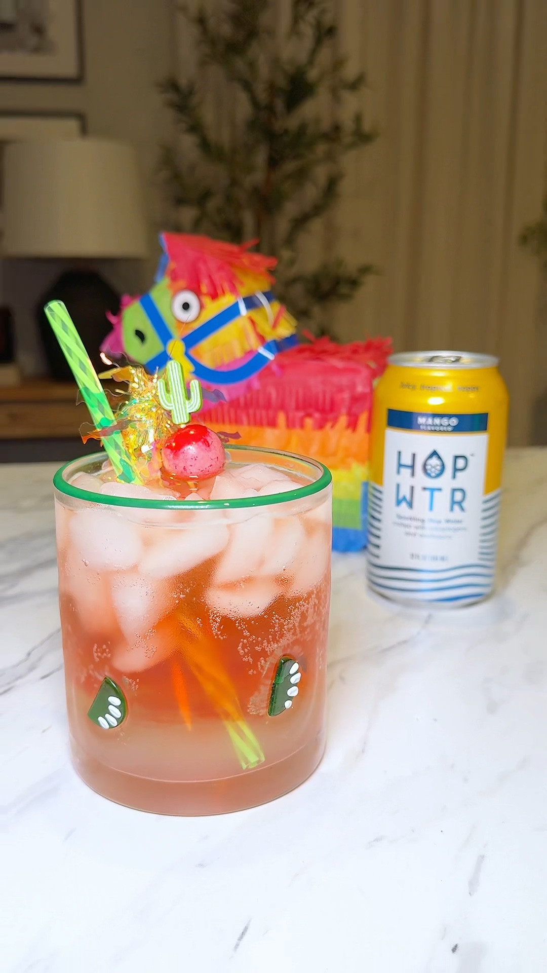 Mocktail Monday Cinco de Mayo edition ft. @hopwtr - Strawberry Mango Margarita 🍓🧊🎉🍋‍🟩🪅🥭😋🤍

How to make:
Grab a festive cup, add ice, add a shot of margarita mix (I used the Trader Joe’s brand), pour in one mango HOP WTR, add in a splash of strawberry syrup, add a festive straw and garnish for fun, stir and enjoy!

#LTKParties #LTKHome