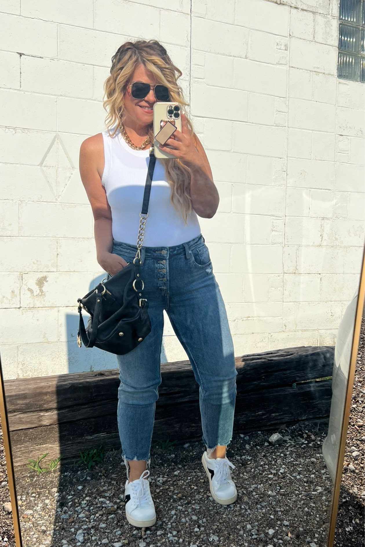 Fall outfit ideas. White tank
Fall jeans
Denim
Leather sneakers
Large black leather bag 

#LTKfindsunder100 #LTKbeauty #LTKstyletip