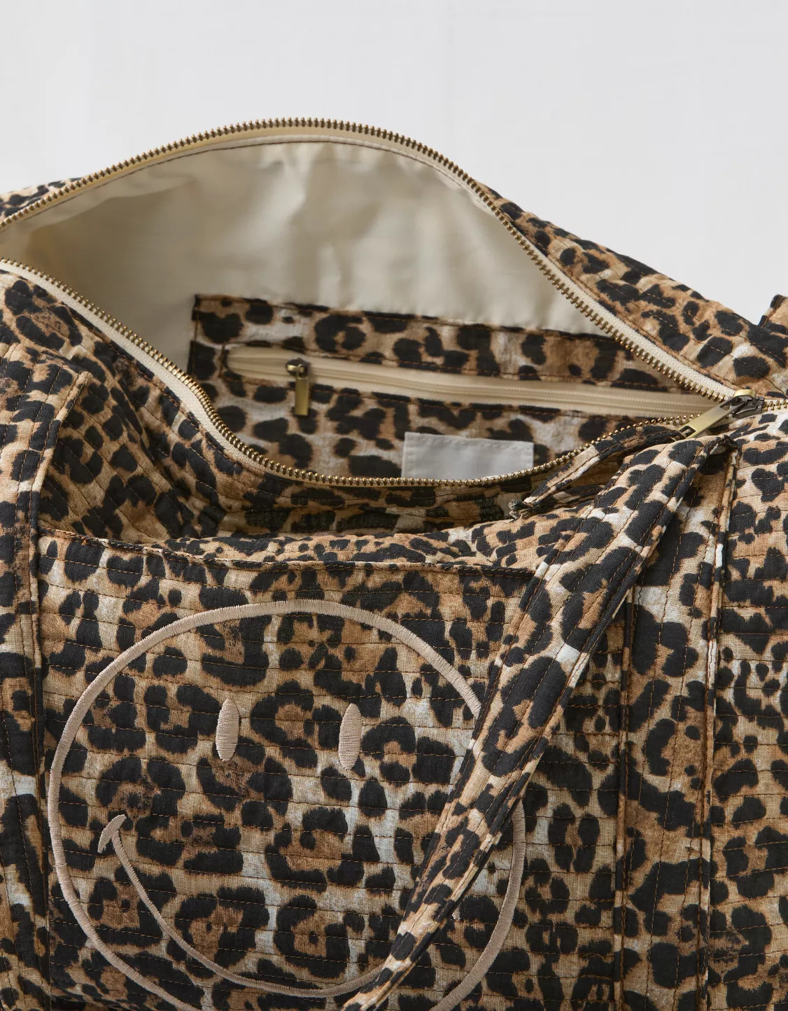 Aerie Smiley® Leopard Quilted Duffle Bag | American Eagle Outfitters (US & CA)