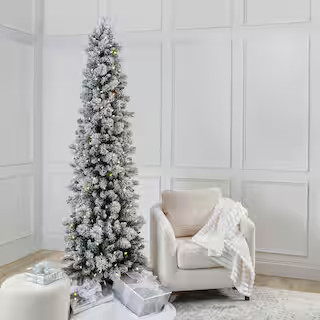 7ft. Pre-Lit Flocked Slim Artificial Christmas Tree, Warm White Twinkle LED Lights by Ashland® |... | Michaels Stores
