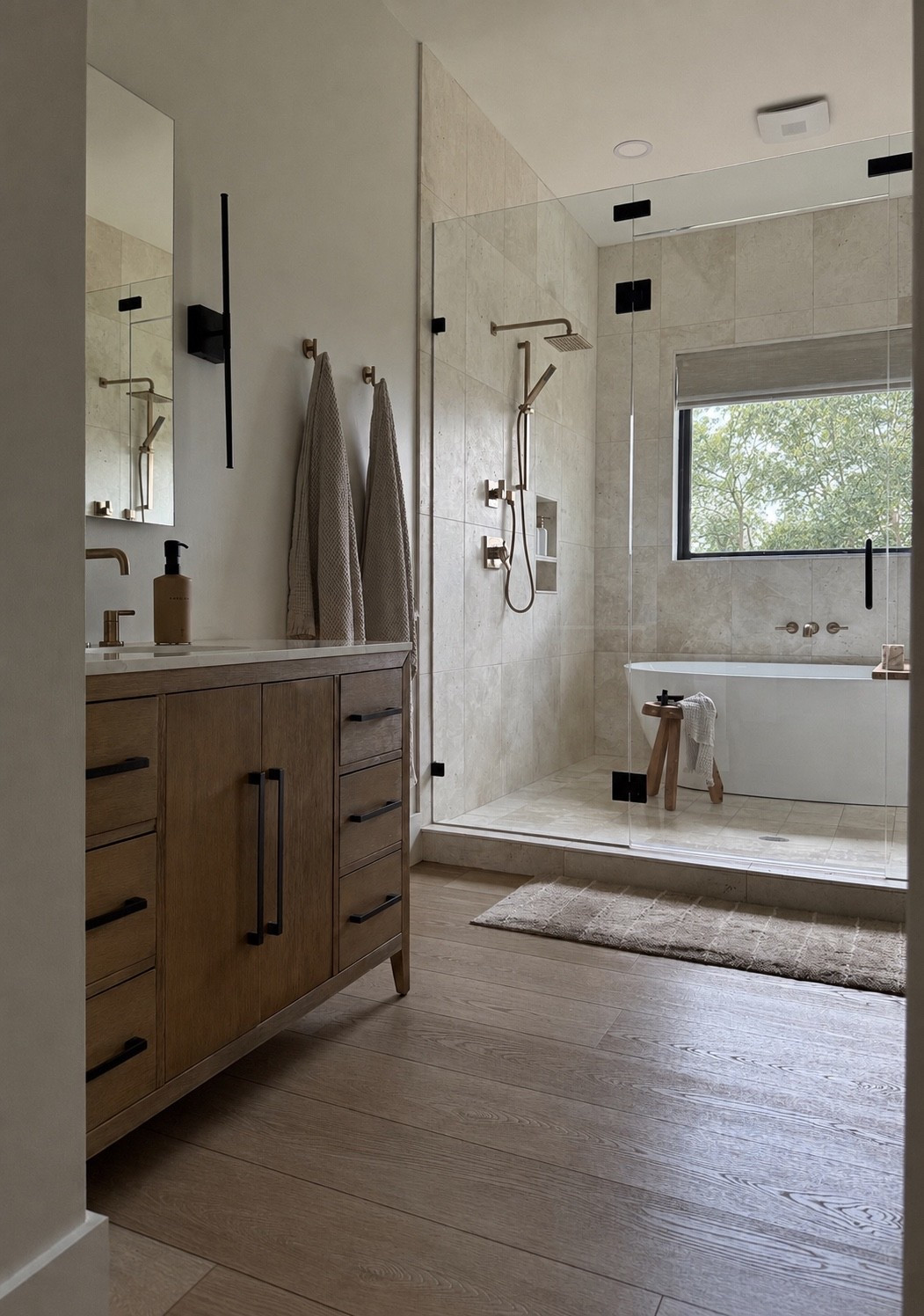 My favorite bathroom vanities that look custom are on sale for Black Friday in July! I love the inset soft-close drawers and doors, the wood tone, the oversized modern pulls, and the beautiful Calcatta Gold quartz top 🤎

Concrete soap dispenser is from The Polished Jar

#LTKHome #LTKSaleAlert