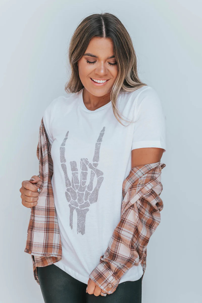 Rock And Roll Skeleton Hand White Graphic Tee | Apricot Lane Boutique