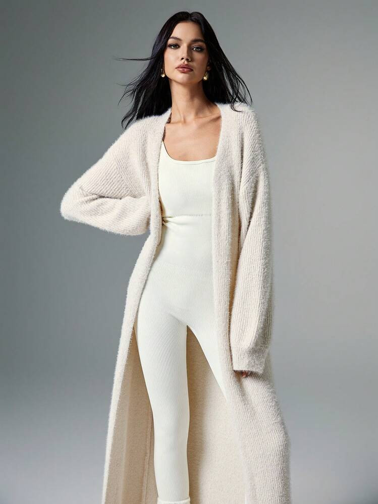 Poéselle Cardigan En Peluche Abricot Extra Long, Cardigan Tricoté Décontracté De Couleur Unie Pour Femmes, Tenues Femmes D'automne, Vêtements D'hiver Femmes, Pulls Femmes, Tissu Doux Et Confortable Chaud, Mode Simple, Style "Old Money", Convient Pour La Rue Quotidienne, Les Déplacements, Le Port À La Maison, Cardigans Femmes D'hiver Décontractés Avec Épaules Tombantes, Khaki Unicolore, Port Décontracté Au Quotidien, Cardigans Longs Femmes, Cardigan Long | SHEIN