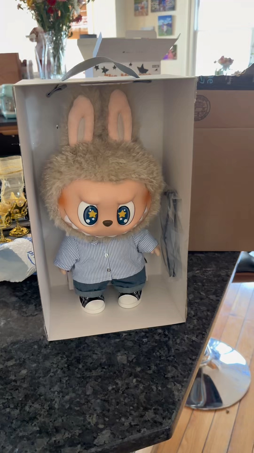 Okay but tell me why this little guy just became the STAR of my shelf 😭💙

This is the Labubu “Flip With Me” vinyl plush and I was not prepared for how good the details are in person. The clickable eye feature changes between Star ⭐, Shocked 😵‍💫 and pink Love 💗 eyes — it’s literally a whole personality shift with one click.

And can we talk about the outfit?! The tiny blue pinstripe button-down, real denim jeans, little sneakers… and the glasses?! It’s giving designer toy energy but still soft and cozy.

If you’re a collector, a Pop Mart lover, or need the coolest gift idea — this one is SUCH a statement piece.

#LTKunboxing #LTKKids