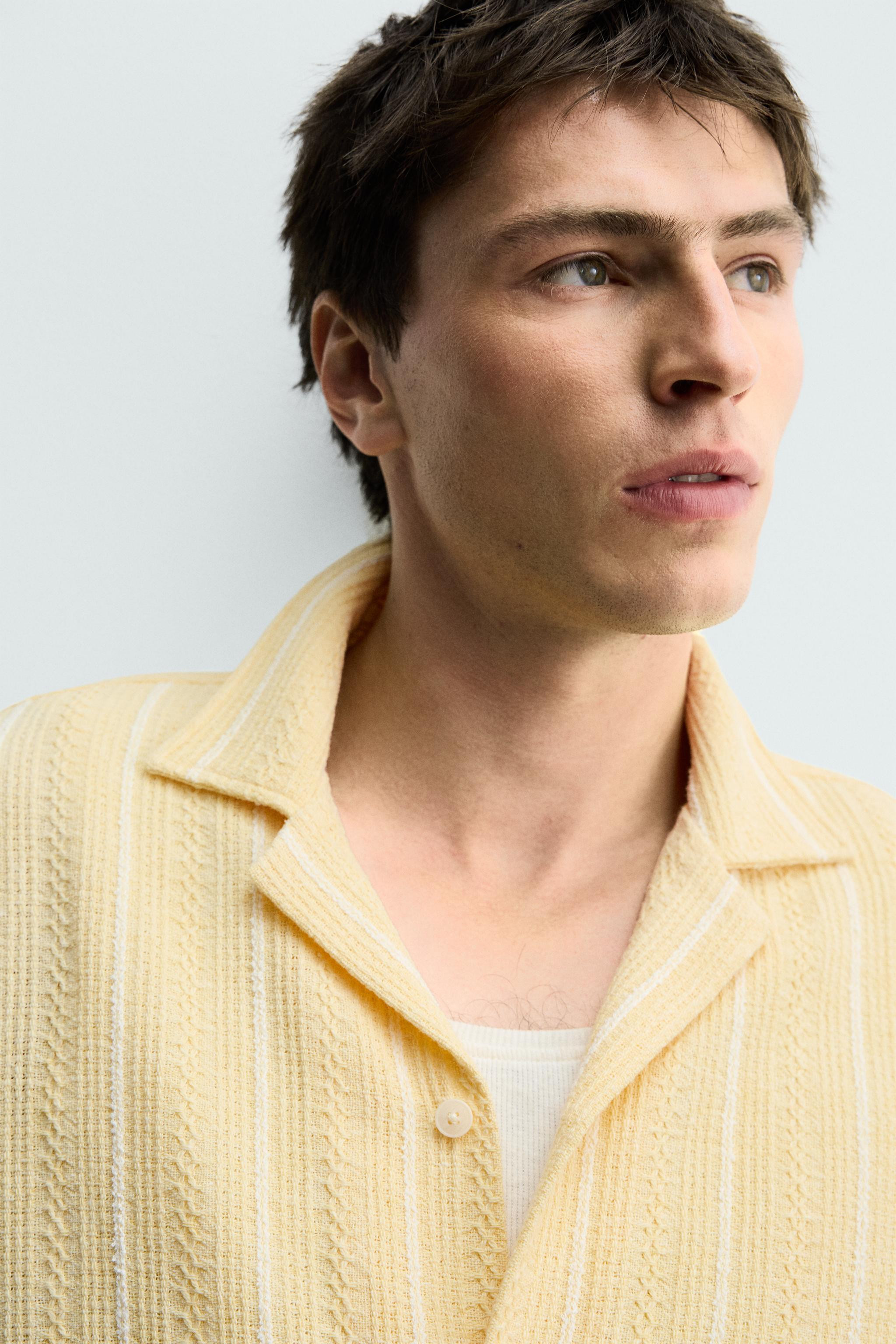 Regular fit shirt made of cotton blend fabric. Spread collar and short sleeves. Side vents at hem... | Zara US