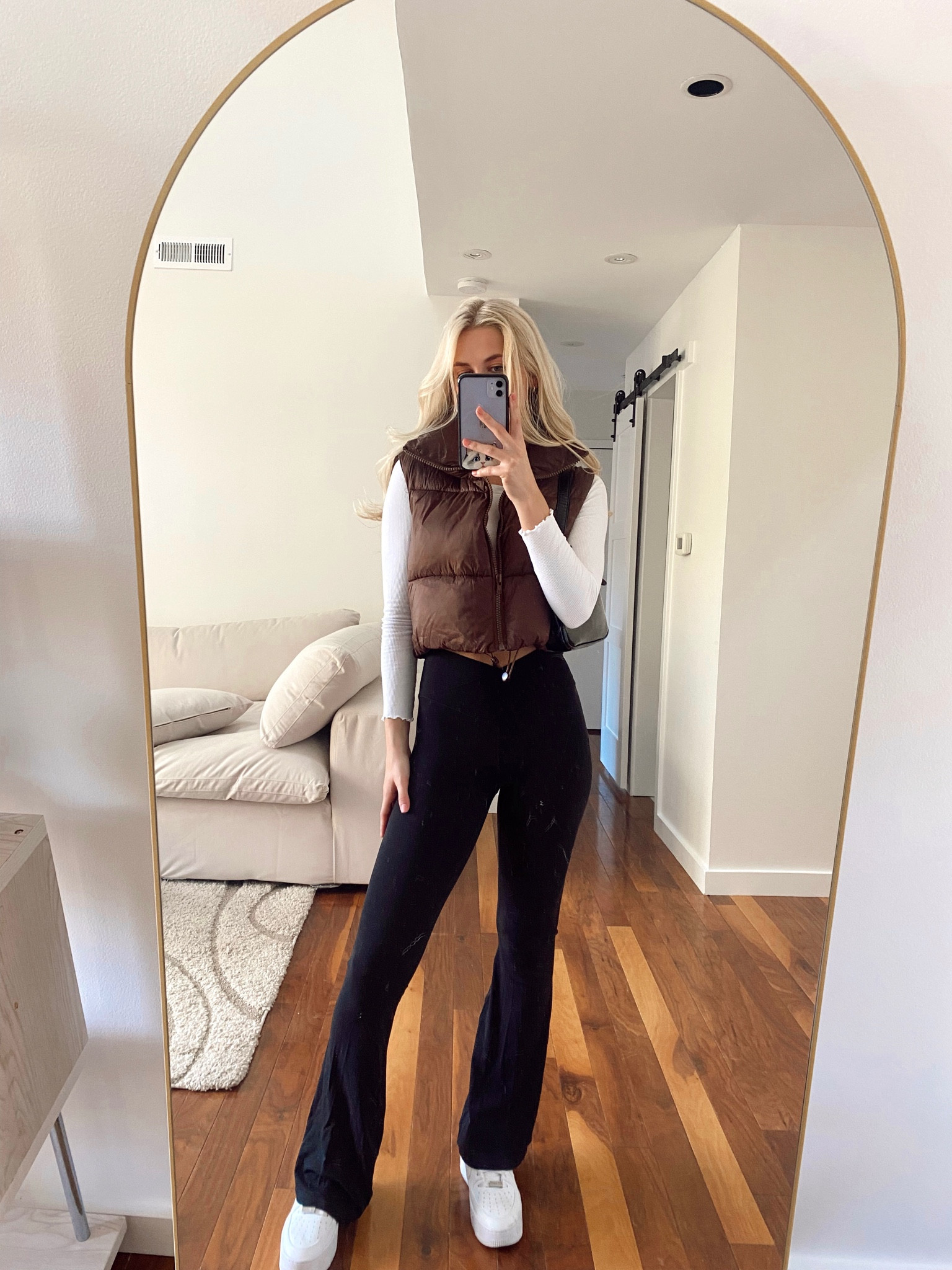 Brown puffer vest, flare leggings, tennis shoes, AF1s, white long sleeve shirt, gold trim mirror, curved mirror, full body mirror

Size S vest, shirt, pants

#LTKstyletip #LTKfit #LTKSeasonal