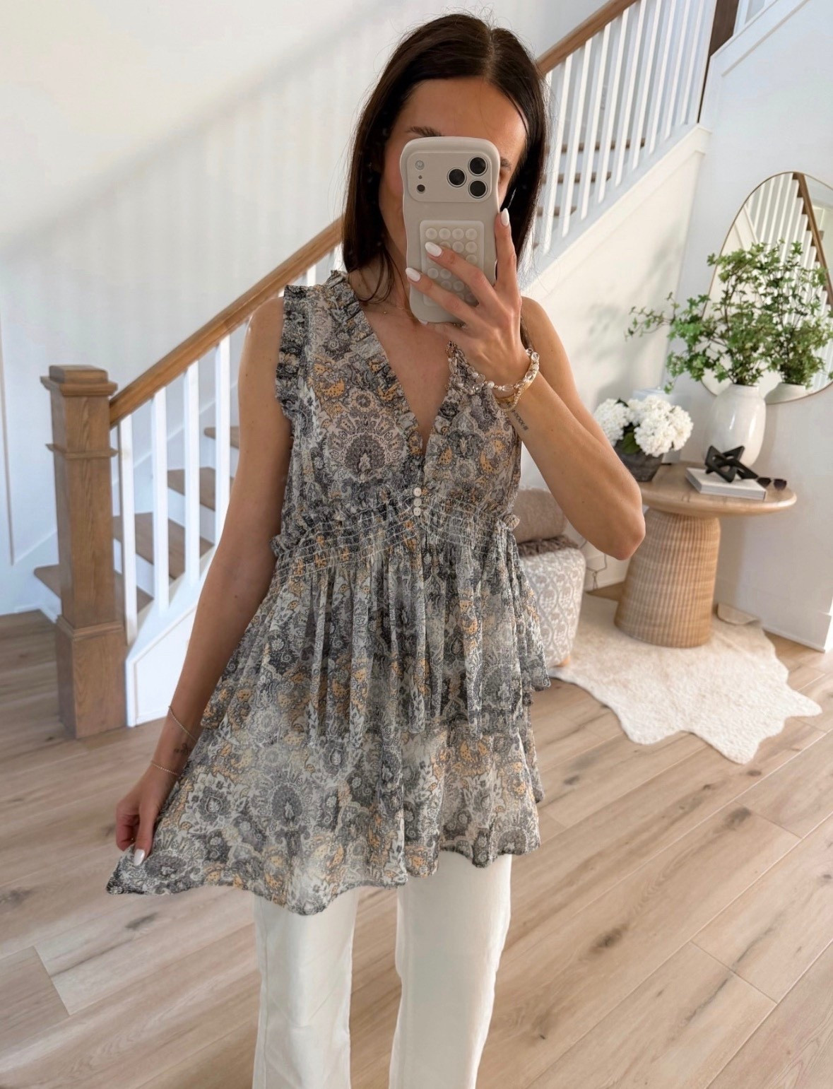 this top is one of those easy throw on pieces that instantly looks styled. flowy, lightweight, and so flattering with the little ruffle detail. i love it paired with white denim but it would also be so cute with shorts

spring tops, flowy blouse, everyday outfit, casual chic, neutral style, white denim outfit, easy outfits, annabrstyle 

#LTKSeasonal #LTKOver40 #LTKootd