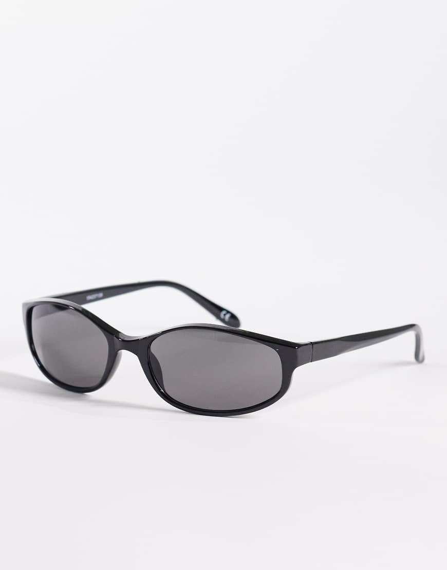 ASOS DESIGN slim oval wrap sunglasses in black frame with black lens | ASOS (Global)