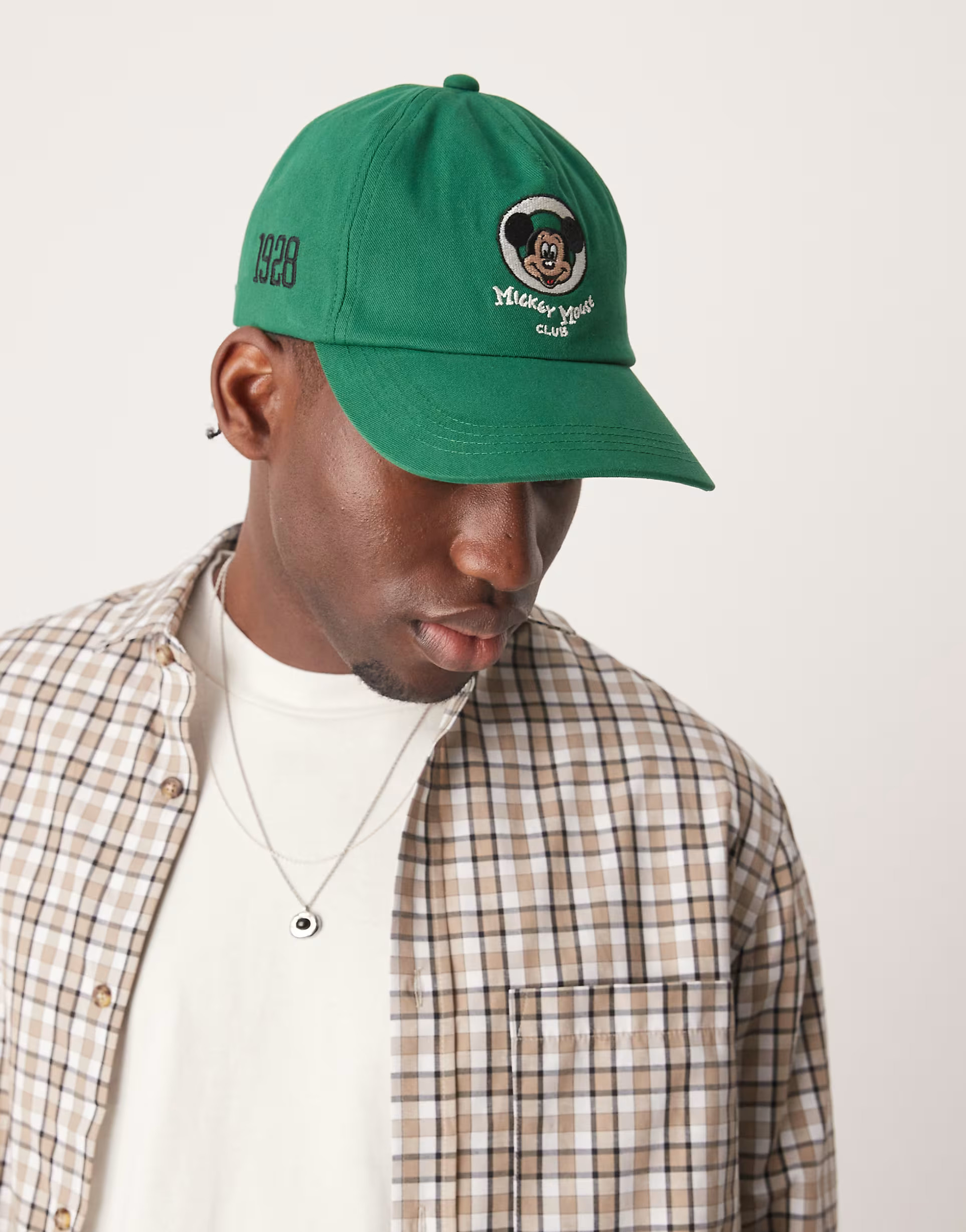 ASOS DESIGN Disney Mickey vintage cap in green | ASOS (Global)