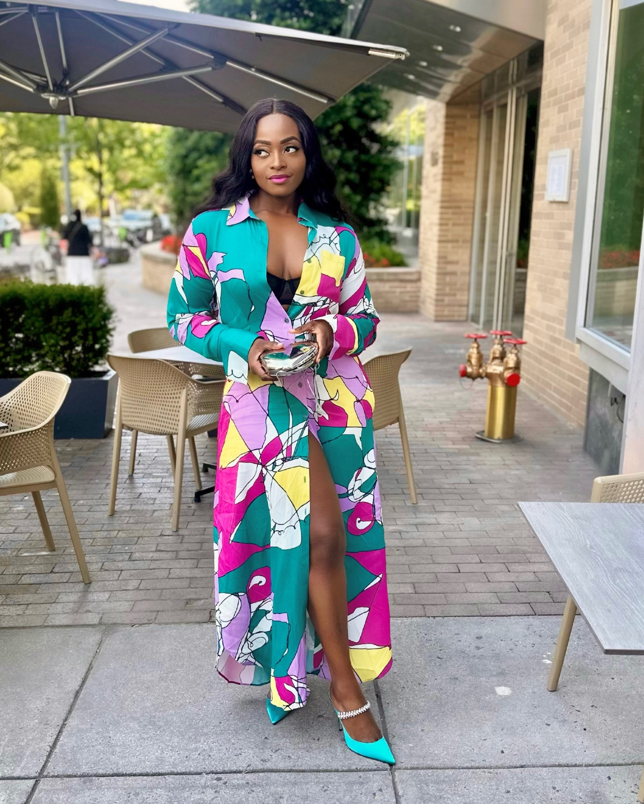 Shirt dress: Kai collective
Mules: Jimmy Choo
Clutch: Zara
Earrings: Valentino 

I listed 3 different long sleeve dresses that would pair well with the jimmy choo mules  because the dress I’m wearing In the picture is sold out.