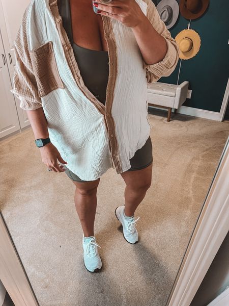 This colorblock button up shirt is going to be perfect year round. It’s not too thick so good for a layering piece over shorts or swimsuit cover during the warm months but will still be cute with jeans also. I layered it with my one piece athleisure jumpsuit. The best part of this jumpsuit - no bra required!!! 

Plus size outfits | plus size style | jumpsuit | romper | bike shorts | white button up | curvy | sneakers | ootd | outfit ideas 

#LTKFitness #LTKFind #LTKcurves