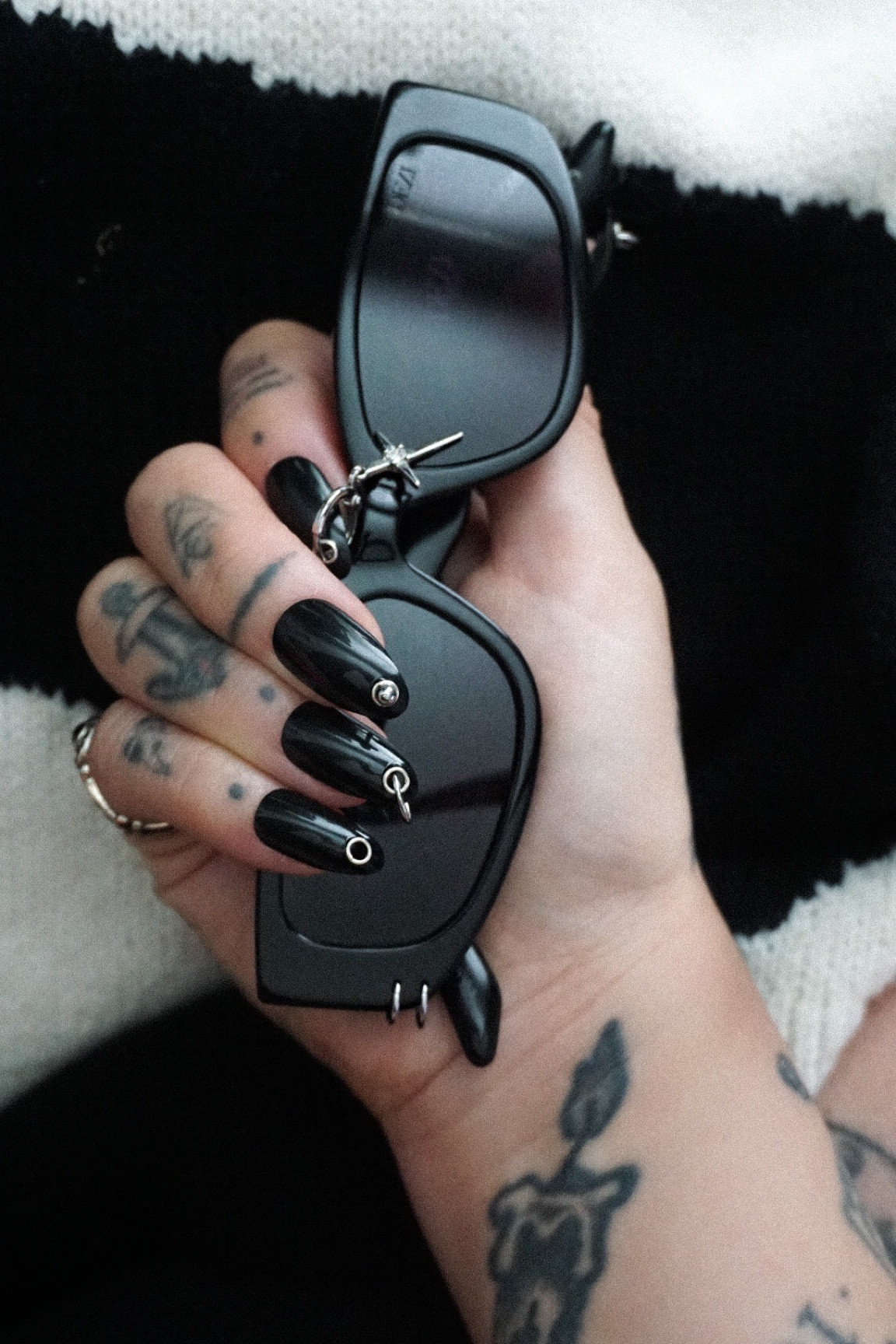 Black Sunnies with metal hardware details *chefs kiss*

#LTKGiftGuide #LTKstyletip #LTKFind