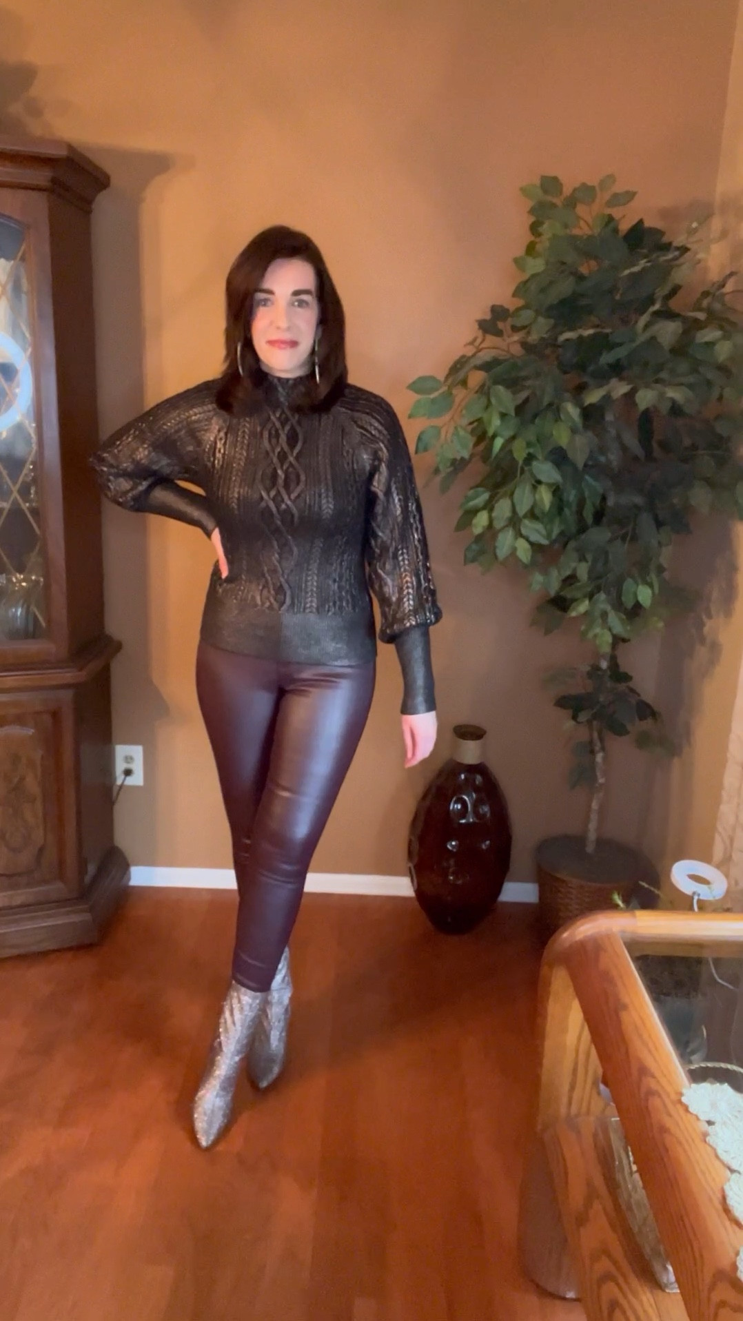 Black metallic foil cable knit mock neck sweater (size small), High waisted burgundy coated skinny jeans (size 4). Silver metallic boots (size 8.5). #sweater #sweaters #mockneck #metallicsweater #pants #jeans #skinnyjeans #burgundyjeans #boots #metallicboots 
Winter Outfits 

#LTKSeasonal #LTKfindsunder100 #LTKstyletip