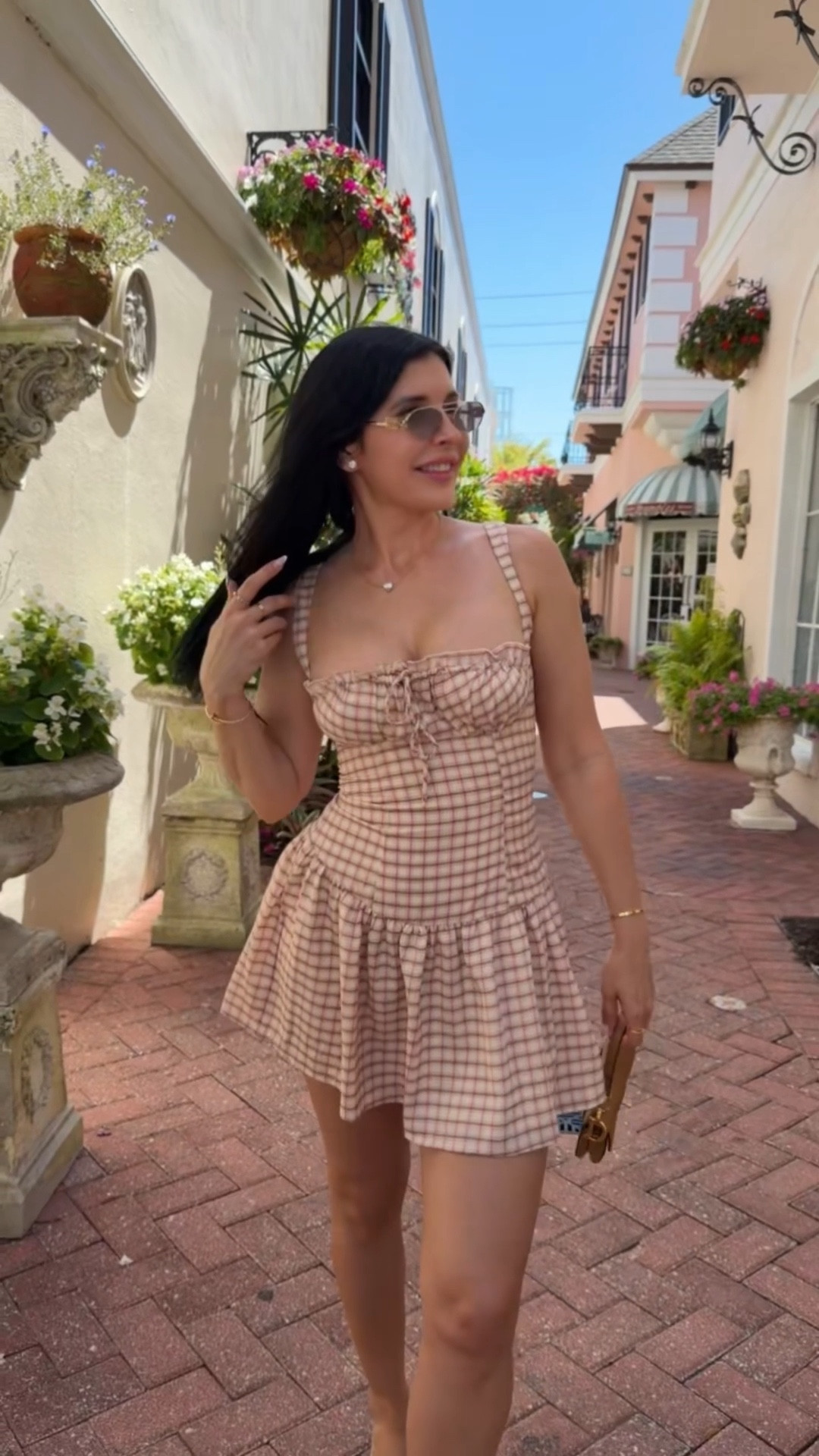 Checkered vacation mini dress 

#LTKTravel #LTKootd #LTKgrwm