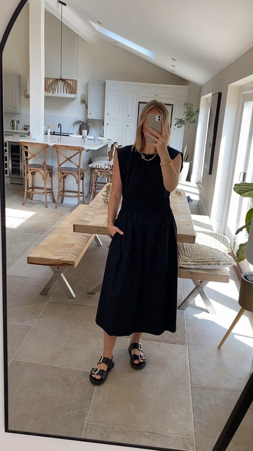 Chic and stylish black dress
100% cotton with flattering waist smocking and structured shoulder detail. 
Crops cotton poplin with pockets 
Wearing a 14 regular 

#LTKsummer #LTKmidsize #LTKuk
