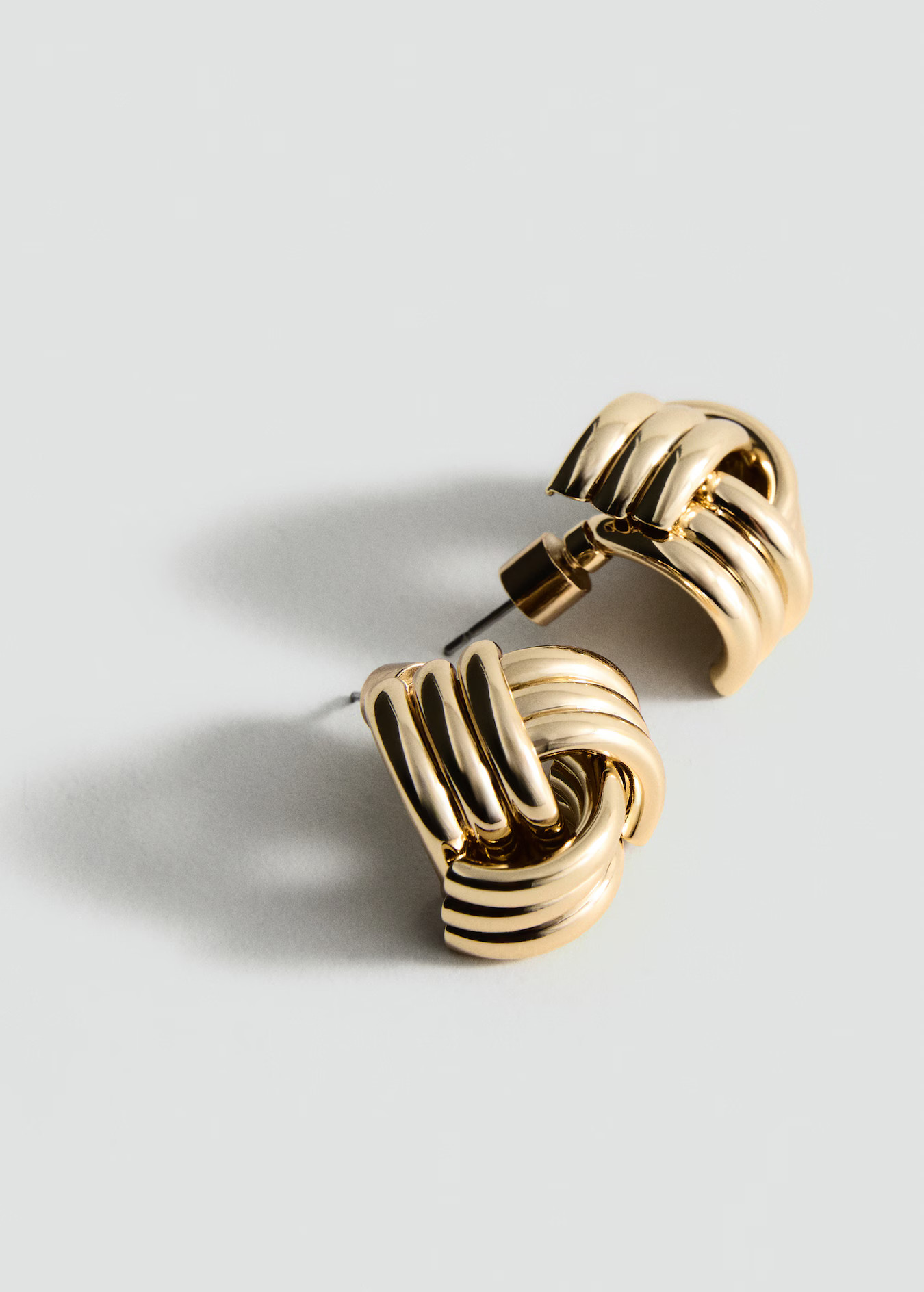 Intertwined knot earrings - Women | MANGO United Kingdom | MANGO (UK)