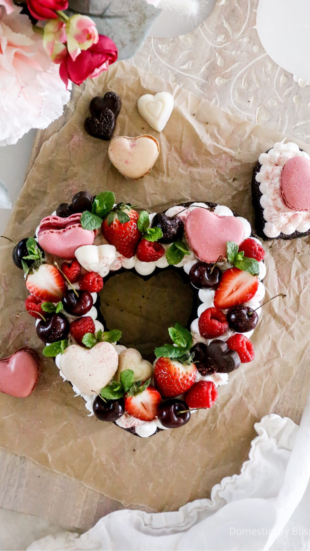This Valentine’s Heart Brownie is a fun way to decorate a brownie with frosting, fruit, heart macaroons, chocolate, mint, and edible glitter.

See recipe:
https://domesticallyblissful.com/valentines-heart-brownie/

🔗 Join our newsletter: https://domesticallyblissful.com/newsletter/ 



#LTKValentine #LTKfoodie #LTKSeasonal