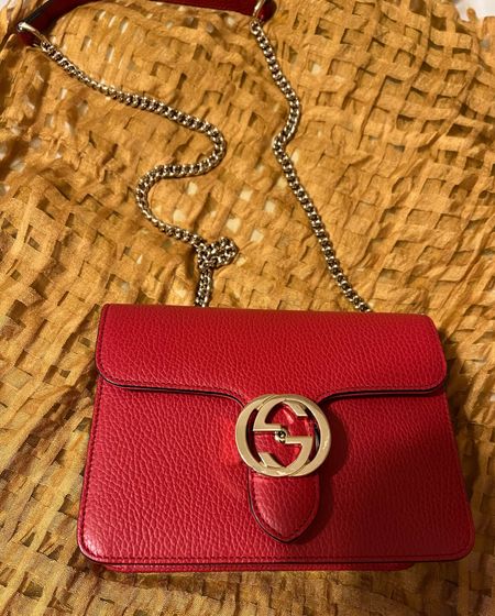 Red interlocking Gucci Purse with gold chain. I love this bag for a pop of color.  

#LTKstyletip #LTKitbag