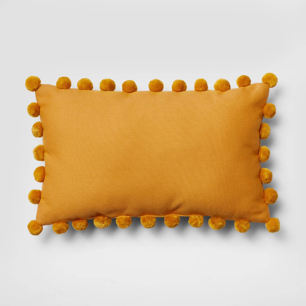 Oblong Pom-Pom Throw Pillow Yellow - Pillowfort | Target