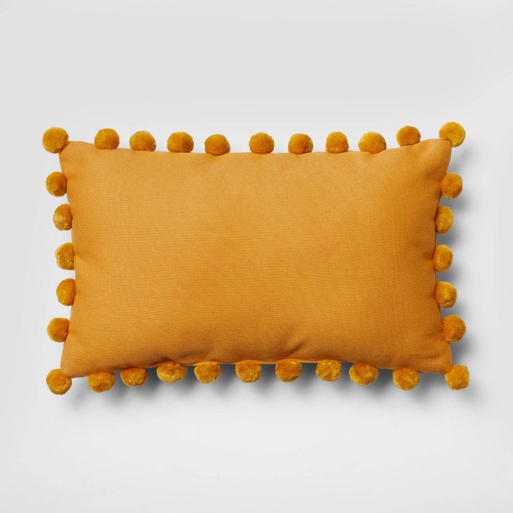 Oblong Pom-Pom Throw Pillow Yellow - Pillowfort | Target