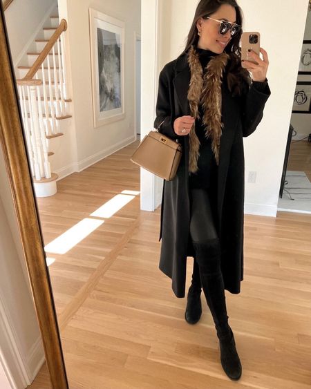 Kat Jamieson of With Love From Kat wears a winter outfit. Wool wrap coat, fur vest, cashmere turtleneck, over the knee boots, faux leather leggings, classic style. 

#LTKSeasonal #LTKstyletip #LTKshoecrush