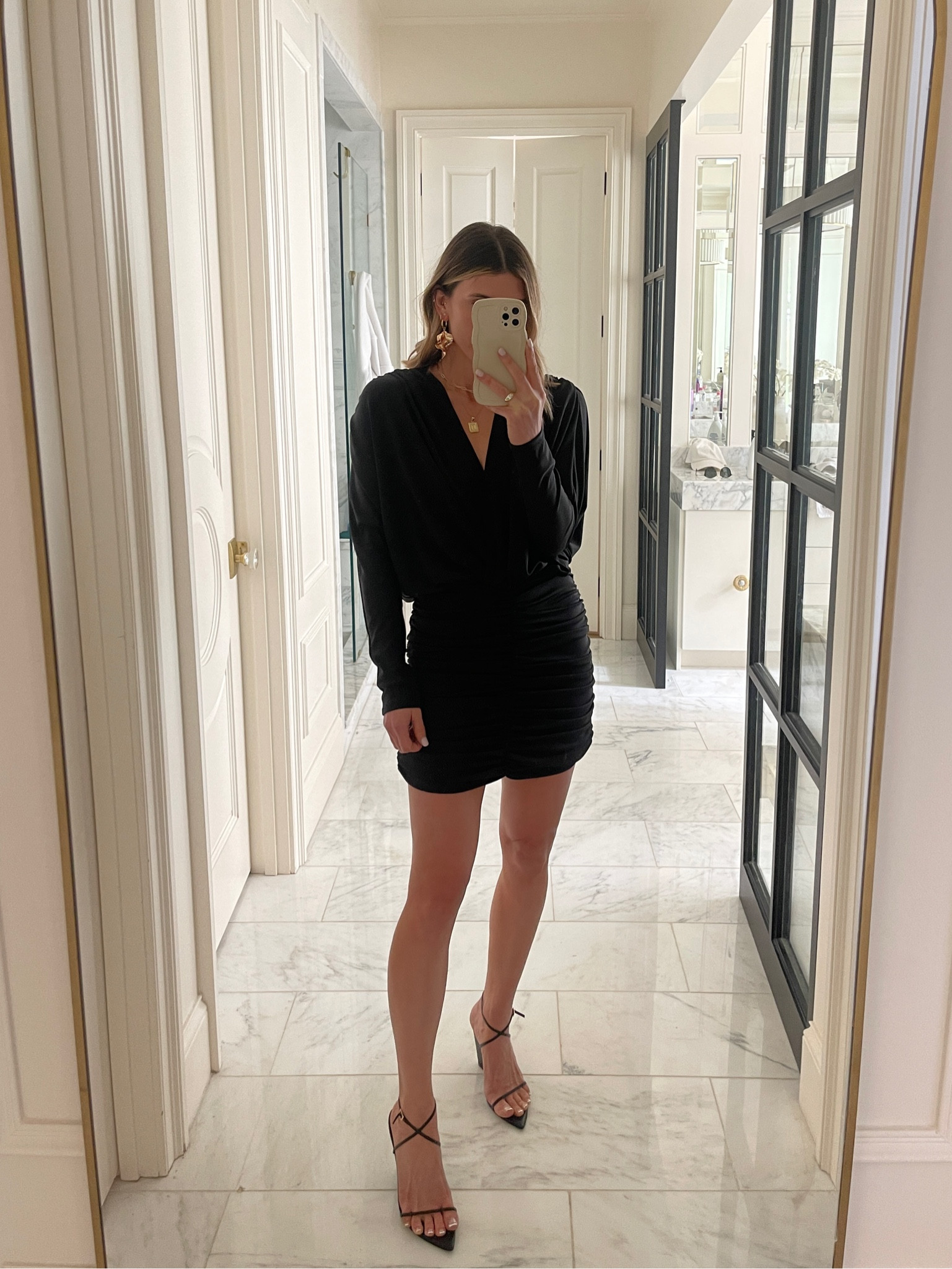 Little black dress from revovle wearing size small 