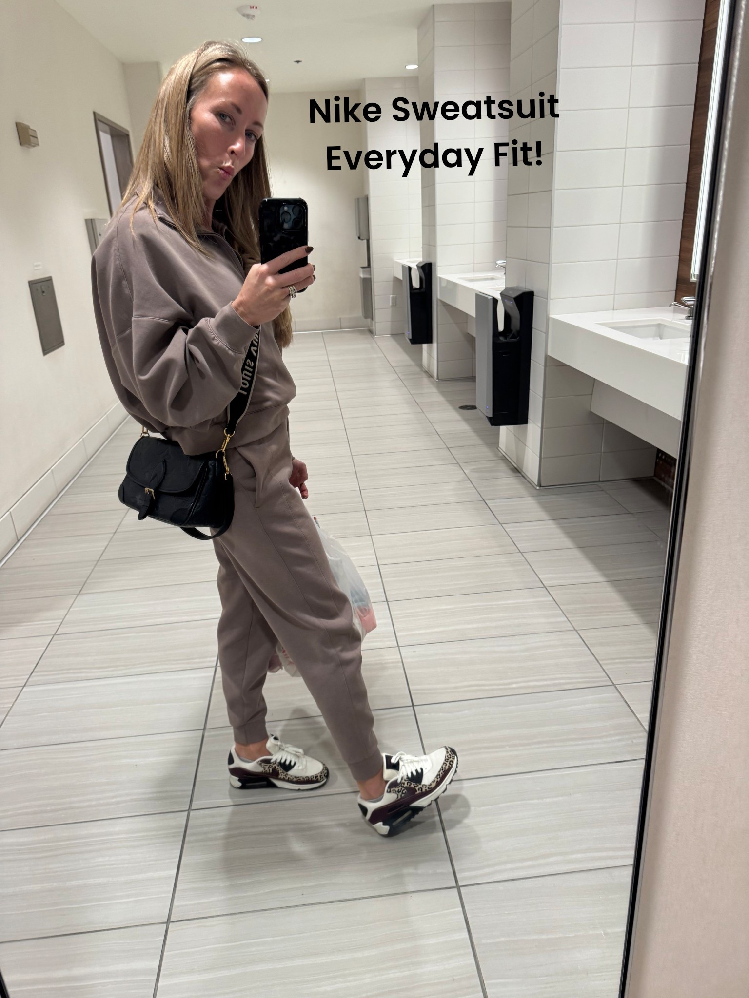 I wear this sweatsuit ALL the time and it still looks brand new!!! Worth it. Mom fit for days. Nike always hits!  And of course my purse. A classic staple  

#LTKOver40 #LTKootd #LTKTravel