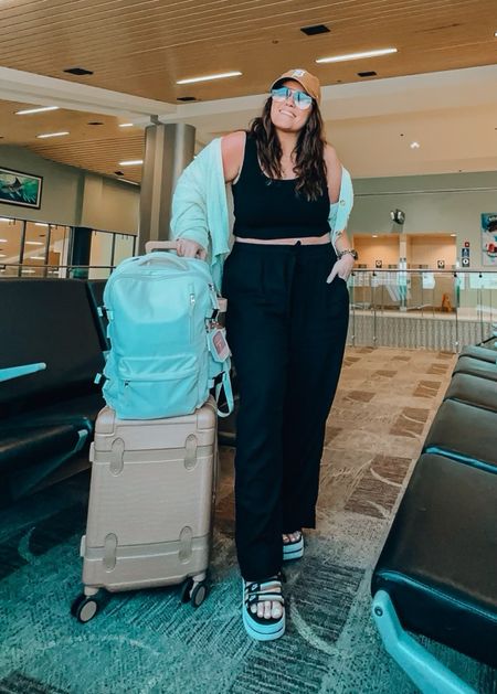 Travel outfit - sweater tank wild fable large 
Free assembly linen pants wearing an xl and would prefer a large they are very roomy 
Platform sandals tts run narrow (so comfy) 
Travel backpack 
Luggage 
Quay sunnies 

#LTKstyletip #LTKSeasonal #LTKshoecrush