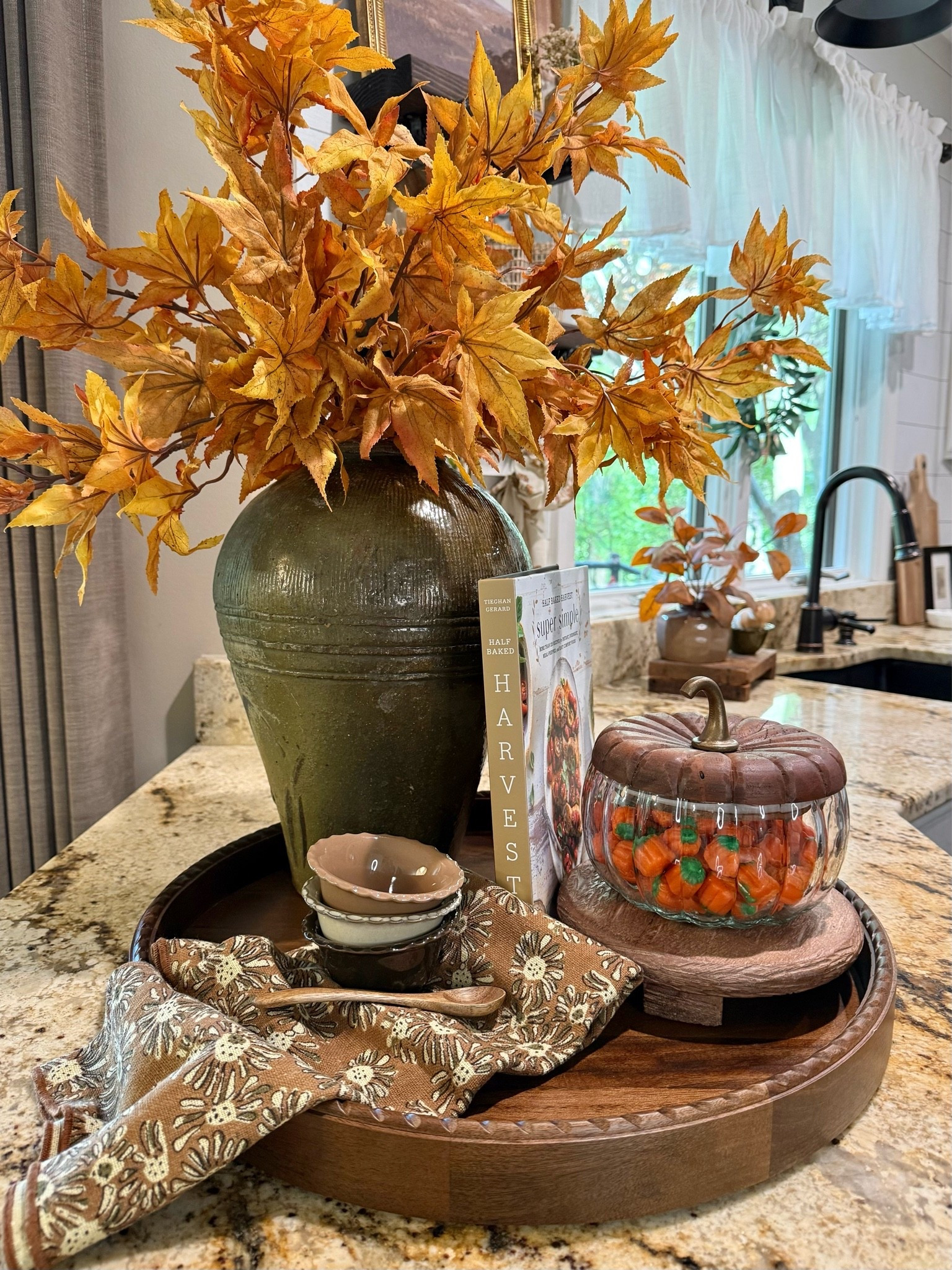 Back in Stock Fall Stems

Timeless & Tasteful Fall Centerpiece
Follow @farmtotablecreations on Instagram for more inspiration.

Reference: 6 stems used in vase. 

This fall tray styling blends cozy charm with functional elegance. A large vintage ceramic vase is filled with golden autumn maple branches, paired with a wood-lidded glass pumpkin candy jar, a seasonal cookbook, and dainty fall bowls resting on a floral kitchen towel. The rich textures and warm tones create a welcoming focal point for your kitchen island or dining table—perfect for enjoying all season long.

#fallcenterpiece #falltraydecor #falldecor #kitchendecor #traydecor #ltkfall #centerpiecestyling #seasonaldecor #kitchenstyling #falldecorideas #autumnhomedecor #amazonhome #amazonfinds #amazon

#LTKHome #LTKSaleAlert #LTKSeasonal
