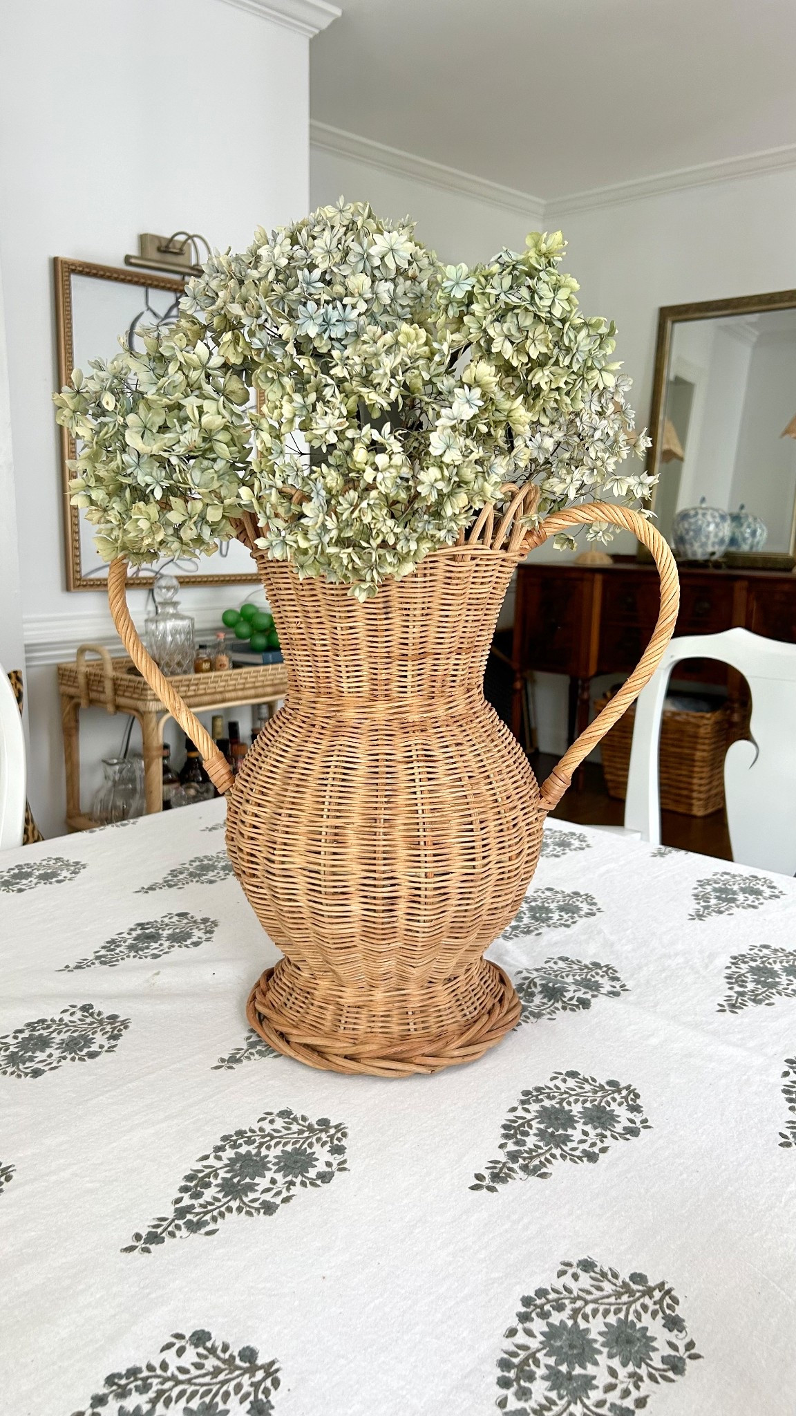 The prettiest rattan urn for your summer blooms.  It’s 16” tall & only $30

#tradhome 

#LTKHome #LTKFindsUnder50