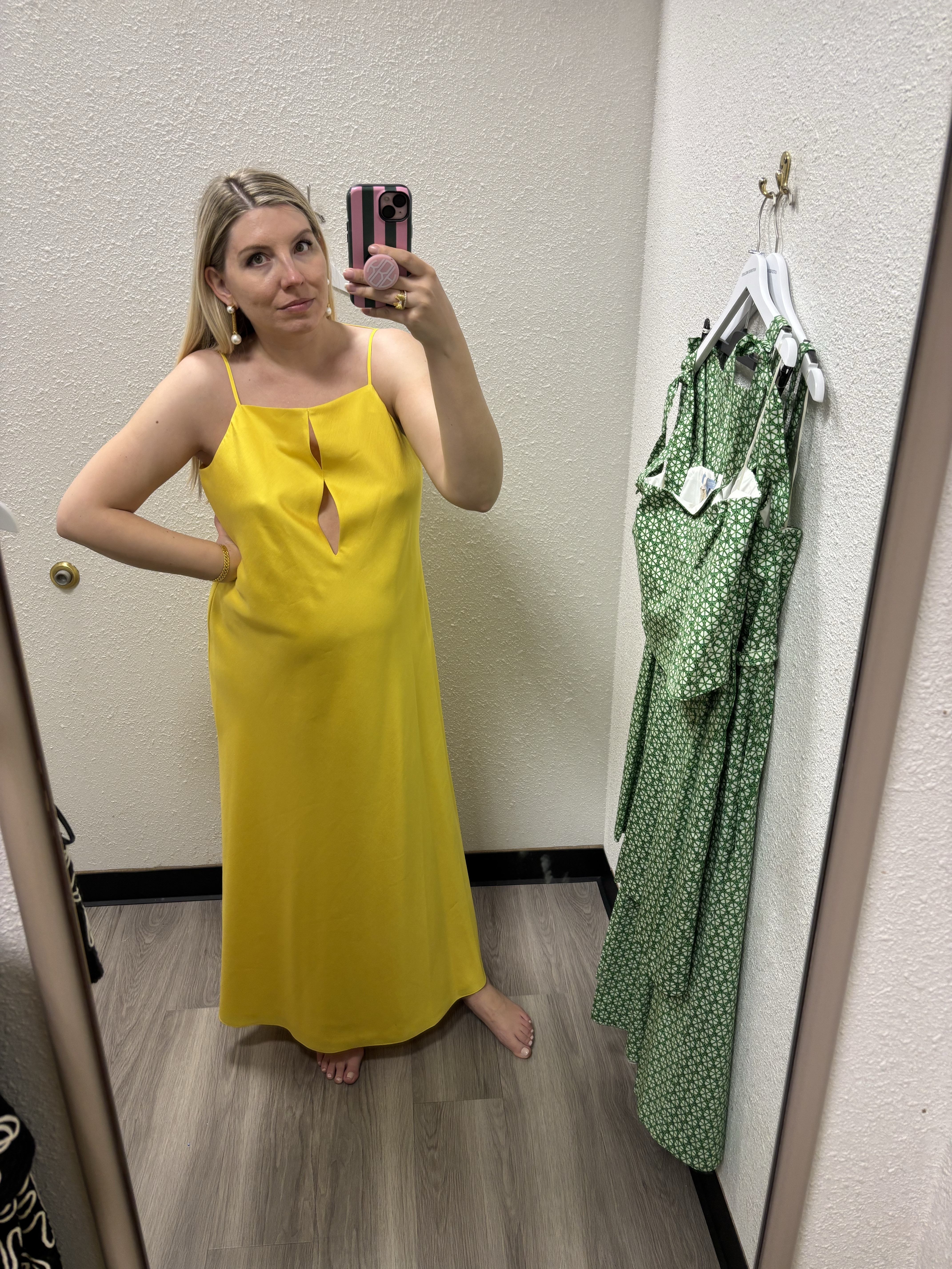 This bright yellow dress is so fun and eye catching! It’s perfect as a resort look (amazing for a dinner by the ocean) but will be perfect all spring and summer.
Fit true to size for me, though there was a bit of extra room in the bust in the large, so I could have sized down to the medium as well. 
Was moderately Bump friendly for my 2nd trimester shape. Very accommodating of the bump, but I found it messed with the silhouette in a way that would make me wait to wear it post-Parton instead. Would be great for early pregnancy, however.

Wedding guest, Easter, vacation, date night, graduation.

#LTKTravel #LTKParties #LTKSeasonal