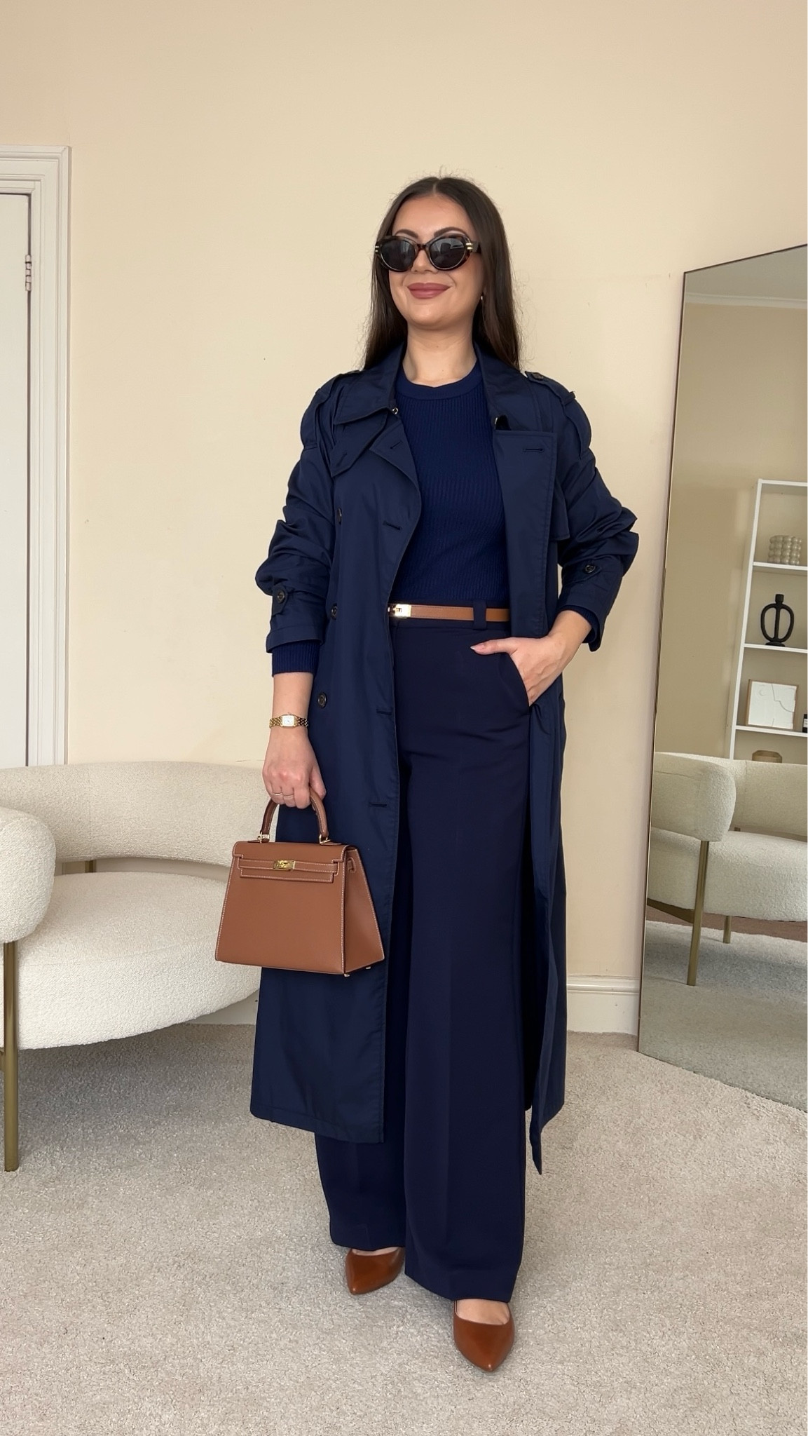 Navy monochrome Spring outfit. Top is from Asos, wearing size S. Trench coat is from Ralph Lauren, wearing size UK8. Trousers are from &OtherStories, wearing size UK10. 

#LTKeurope #LTKfindsunder100 #LTKstyletip