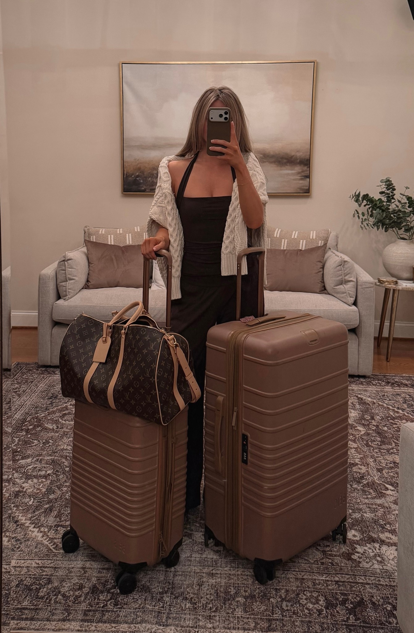 Go-to travel outfit! Comfortable layers, a sleek travel dress, cozy cardigan, and my go-to carry-on luggage that fits everything without sacrificing style. Easy, neutral, and airport-approved from curb to gate.✈️🤎

travel outfit, airport outfit, travel day outfit, travel dress, comfortable travel outfit, neutral travel outfit, airport style, carry on luggage, hard shell luggage, spinner suitcase, travel essentials, capsule wardrobe travel, minimalist travel style, chic travel outfit, women’s travel outfit, packing essentials, LTK travel finds

#LTKTravel #LTKootd #LTKdayinmylife