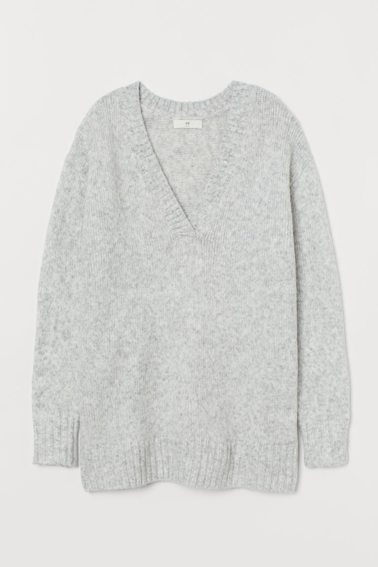 Wide-cut, V-neck sweater in a soft knit with wool content. Dropped shoulders, long sleeves, and r... | H&M (US + CA)
