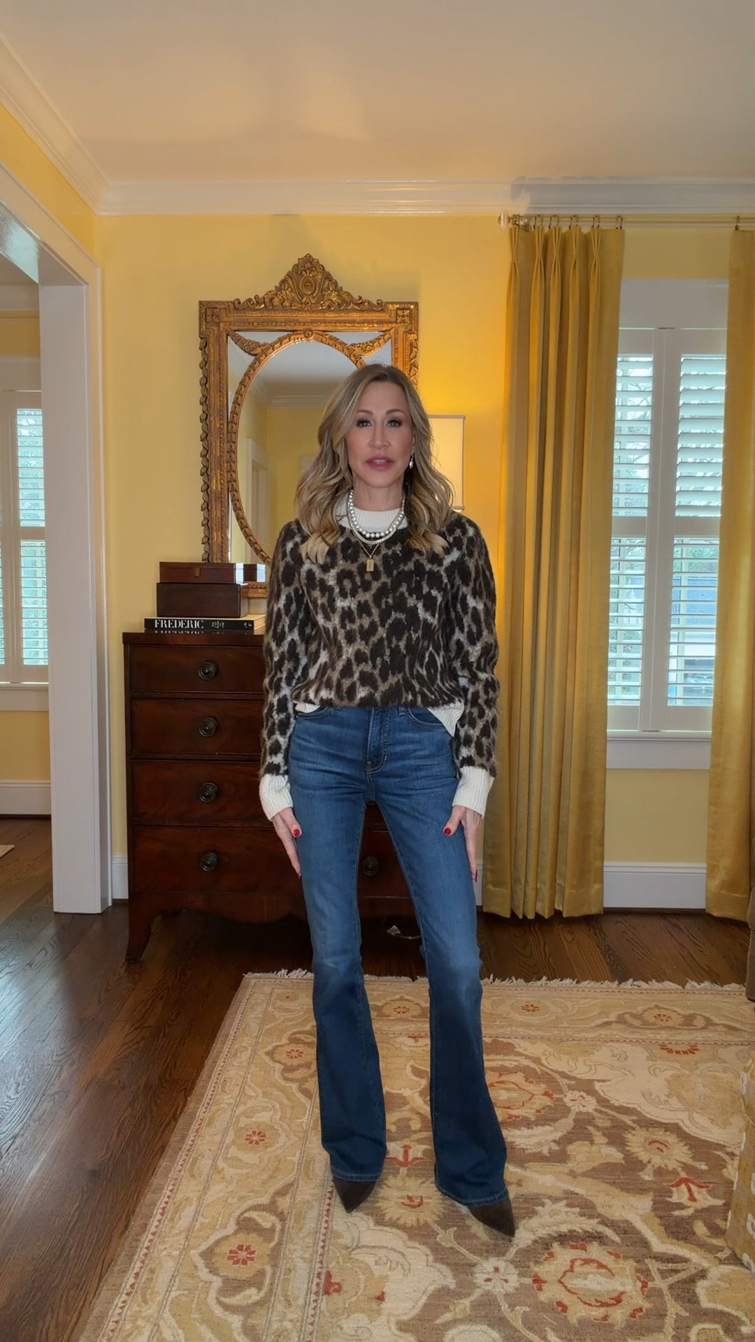 This look is so easy to recreate and is made up of mostly older pieces in my closet!  Leopard sweater, skinny  flare jeans, a vintage fur, chocolate brown suede booties and a brown suede bag.  Necklaces from Hart.