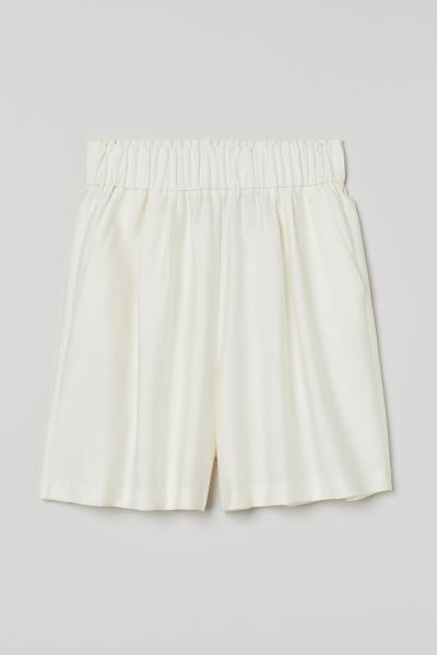 Shorts in a woven linen, viscose, and lyocell blend. High waist, ruffle-trimmed waistband with co... | H&M (US + CA)