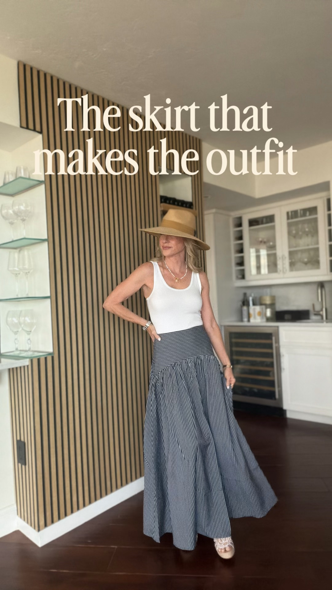 A simple white tank + a statement maxi skirt = effortless summer style. I love how the striped skirt does all the work while the hat and accessories pull everything together. An easy, feminine look to wear now and into early fall.

#LTKootd #LTKOver40 #LTKSeasonal