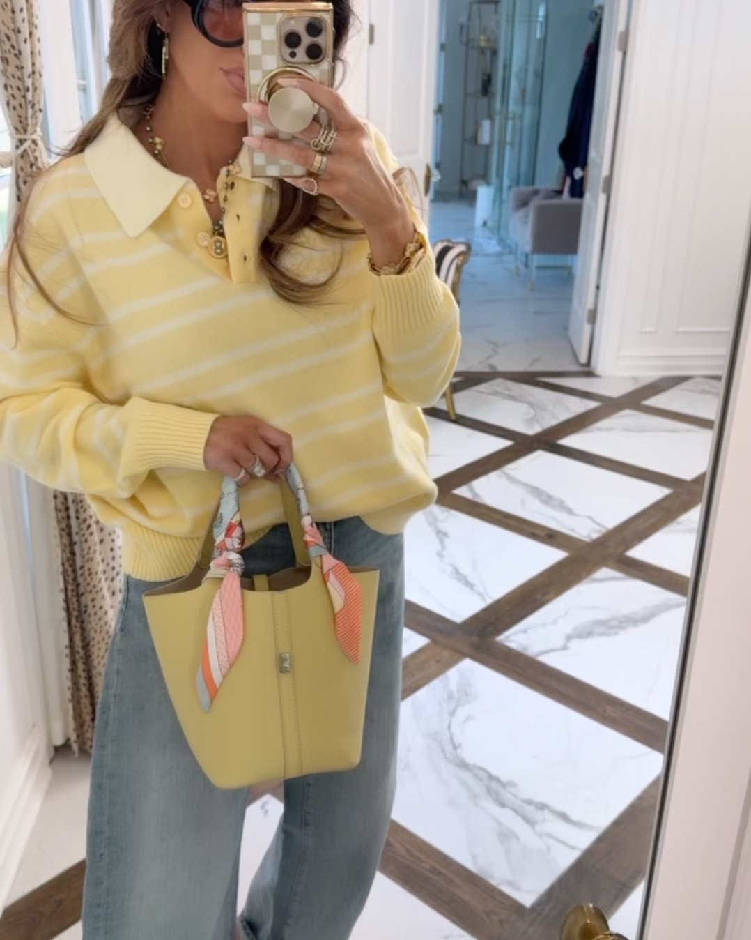 Wearing size small in sweater and US 8 in all jeans post partum!!