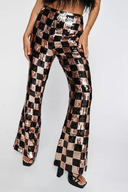 Petite Sequin Checkerboard Kick Flared Pants | Nasty Gal (US)