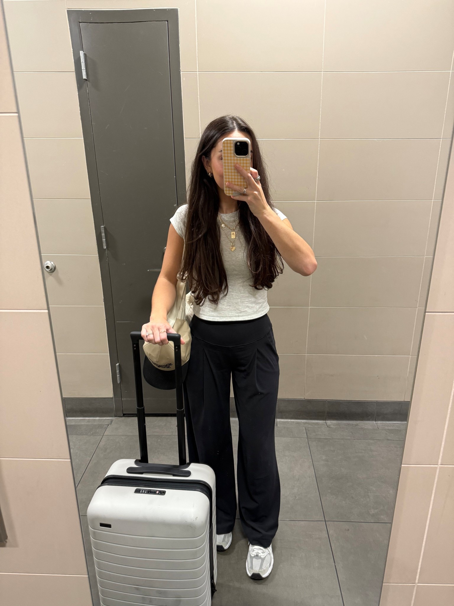 one of my two signature travel outfits of the year 🖤 so comfy and my fav luggage duo (I love my Calpak backpack too for longer trips to fit more in my second carry-on, but for quicker trips I loveee this away shoulder bag because I can fit my laptop + tons of other stuff in it!!

Travel ootd, comfy travel outfit, lululemon outfit

#LTKFindsUnder100 #LTKTravel #LTKActive