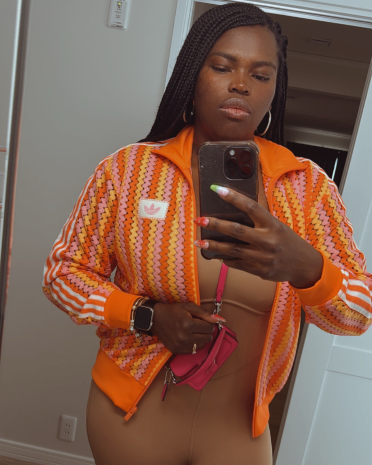 Chasing the sun in my breezy orange and pink Adidas mesh tracksuit and matching shoes. Hello, spring and summer! 🍊🩷

#LTKActive #LTKShoeCrush